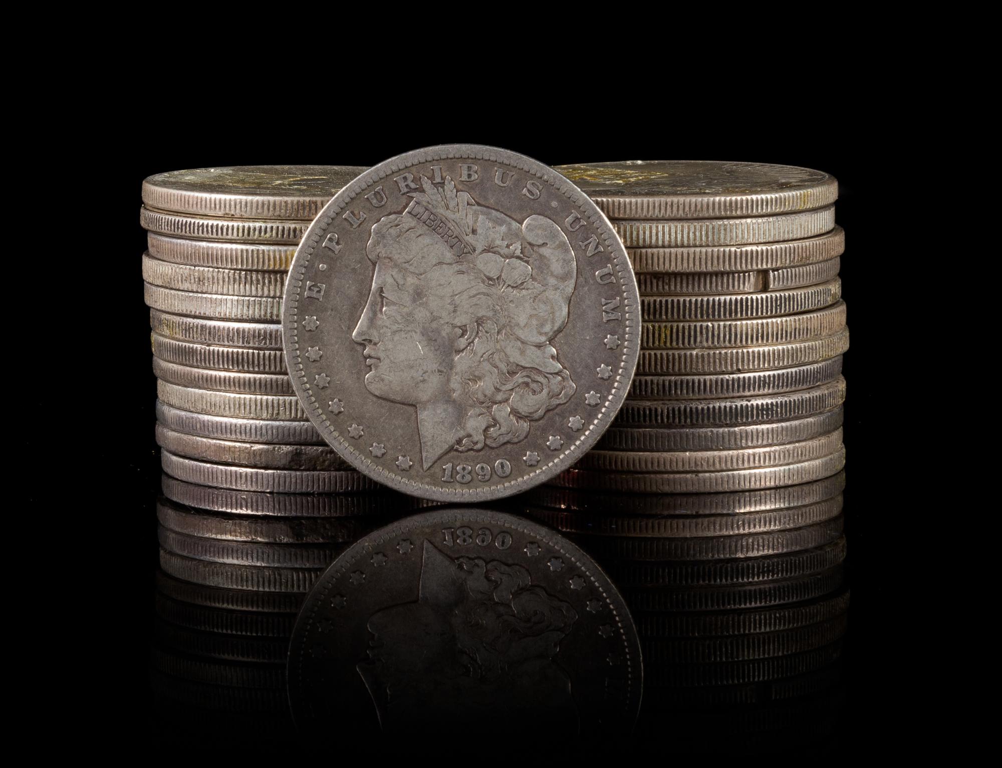 A Collection of United States Morgan and Peace Silver Dollars