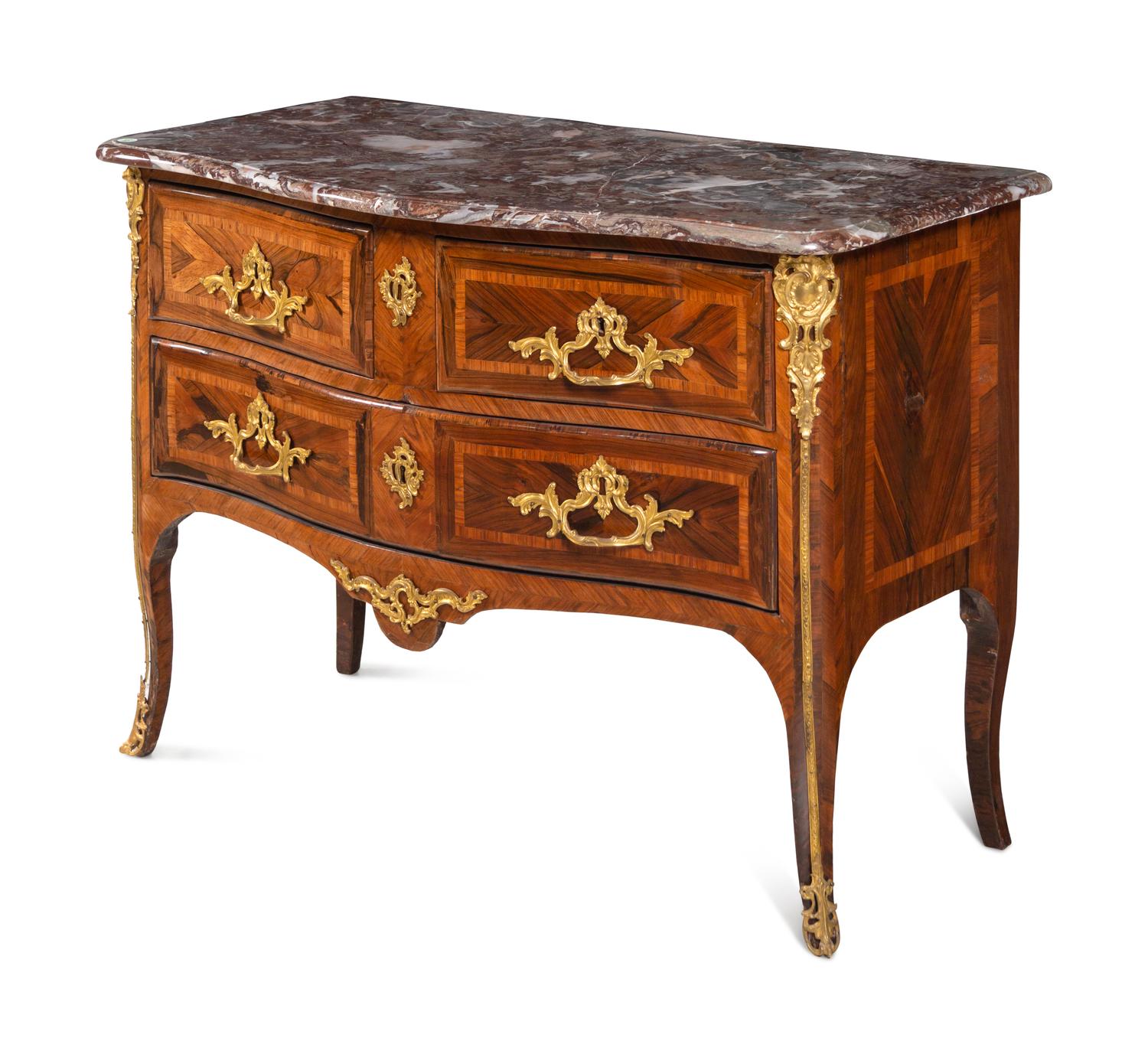 A Régence Gilt Bronze Mounted Marble-Top Commode