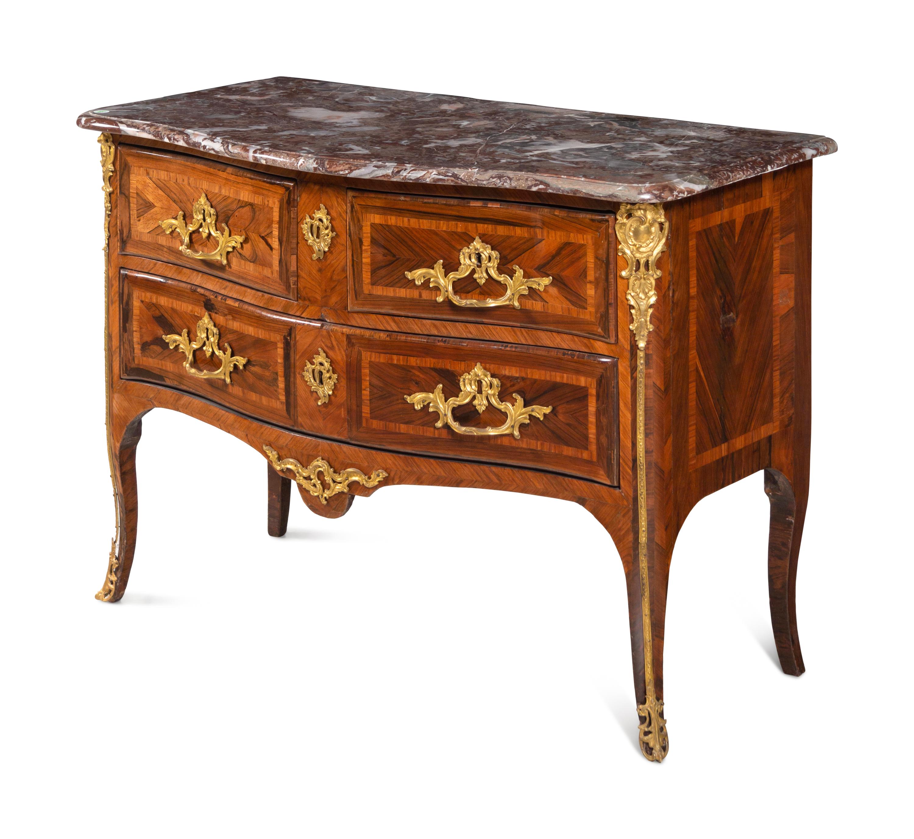 A Régence Gilt Bronze Mounted Marble-Top Commode