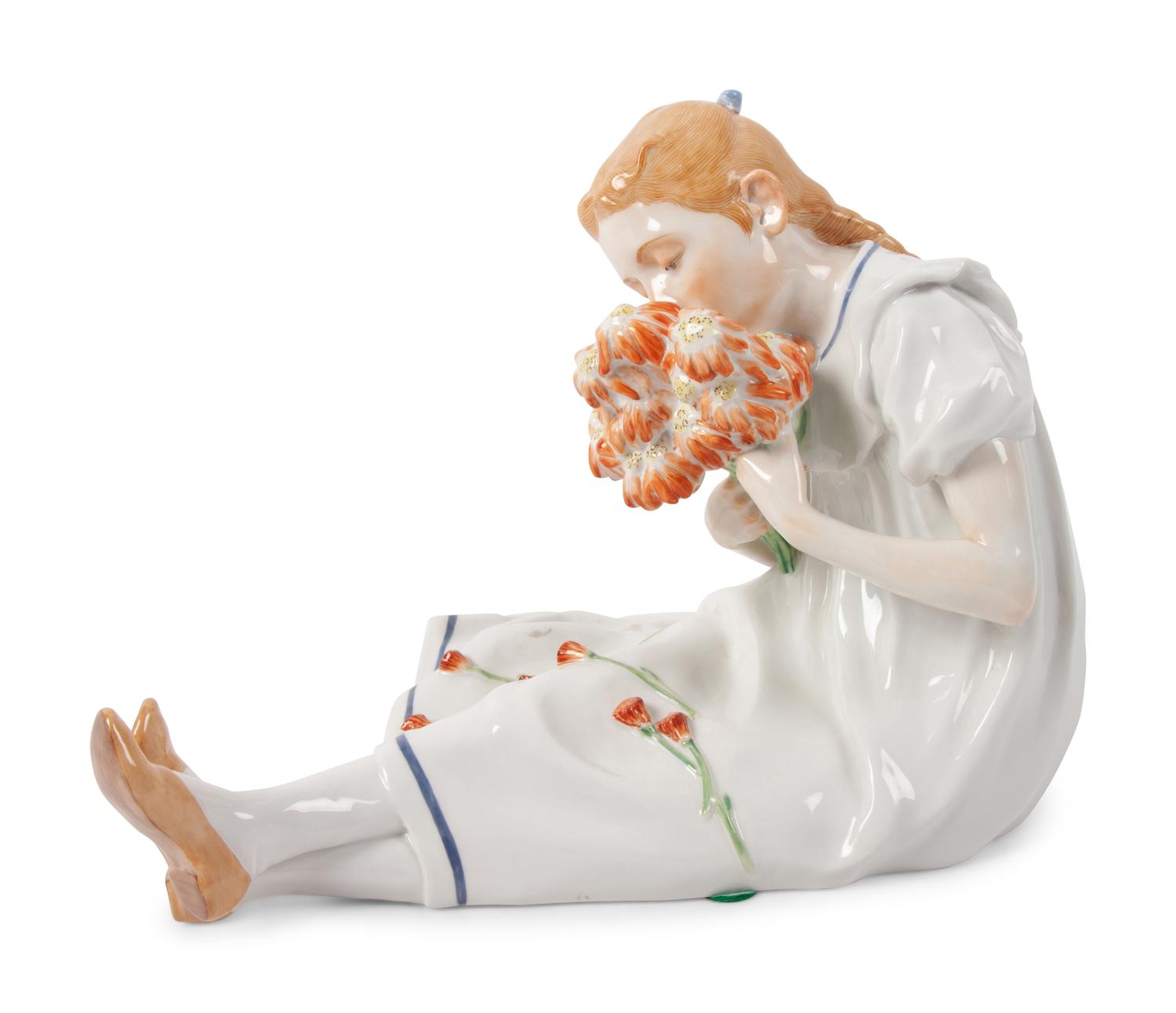 A Meissen Porcelain Figure of a Seated Girl with Flowers by Konrad Hentschel
