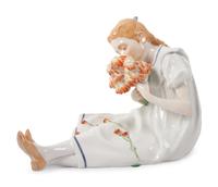A Meissen Porcelain Figure of a Seated Girl with Flowers by Konrad Hentschel