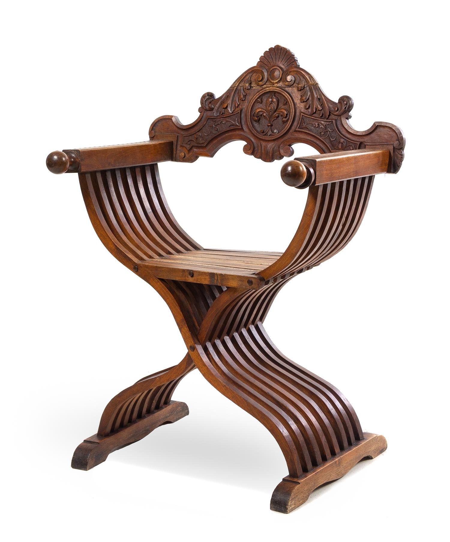A Renaissance Revival Walnut Savonarola Chair Height 37 1/2 inches. — 19TH CENTURY