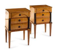 A Pair of Biedermeier Parcel Ebonized Birch Nightstands