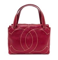 A Chanel Dark Red Caviar Leather Handbag, 11" x 8" x 3.75".