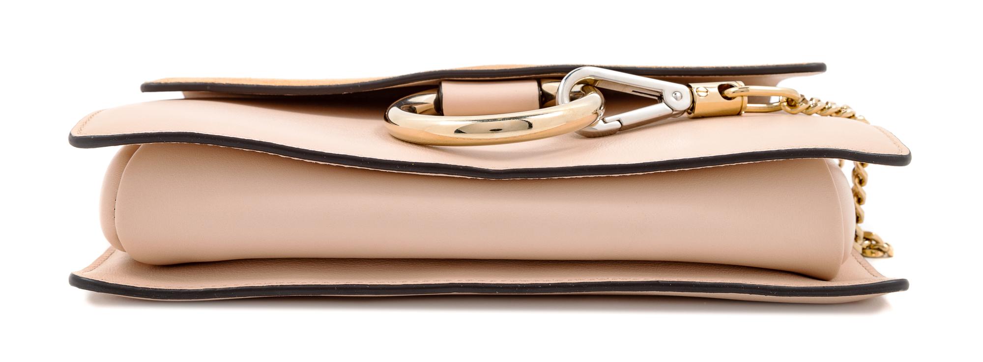 A Chloe Cement Pink Faye Small Shoulder Bag, 6.3" H x 9.4" W x 3.5" D; Strap drop: 20.1"-22.4".