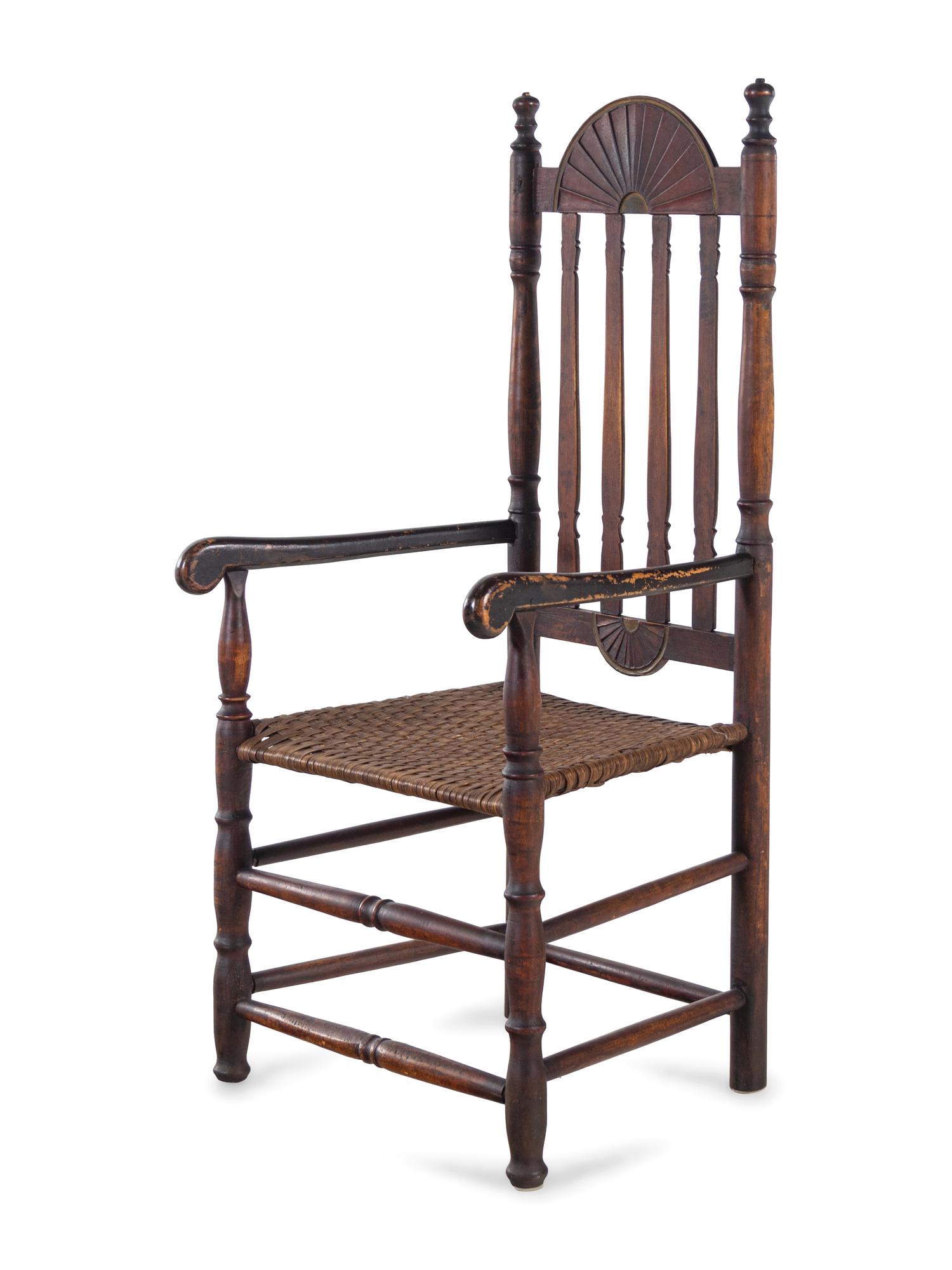 A William and Mary Style Red and Gilt Paint Decorated Bannister Back Woven Splint Seat Armchair