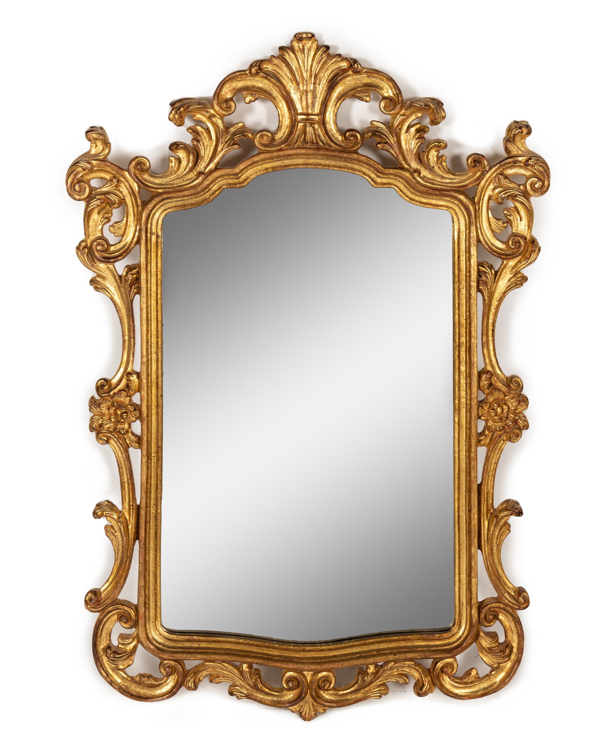 A Baroque Style Giltwood Mirror