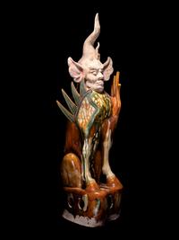 A Chinese Sancai Glazed Pottery Figure of an Earth Spirit, Zhenmushou