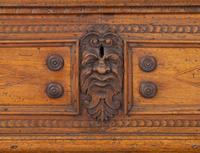 An Italian Carved Walnut Cassone