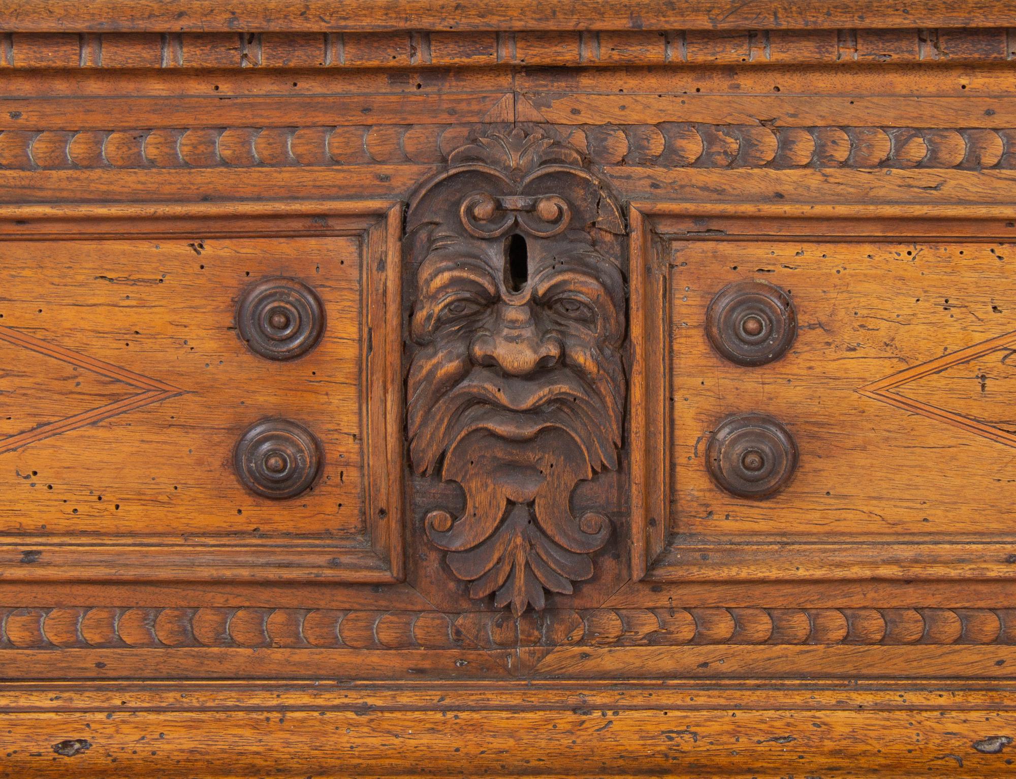 An Italian Carved Walnut Cassone