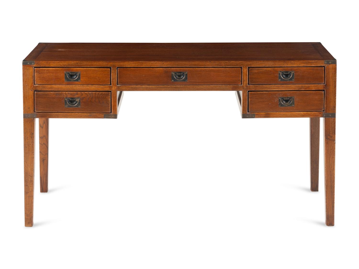 An Arts and Crafts Style Brass-Mounted Oak Desk