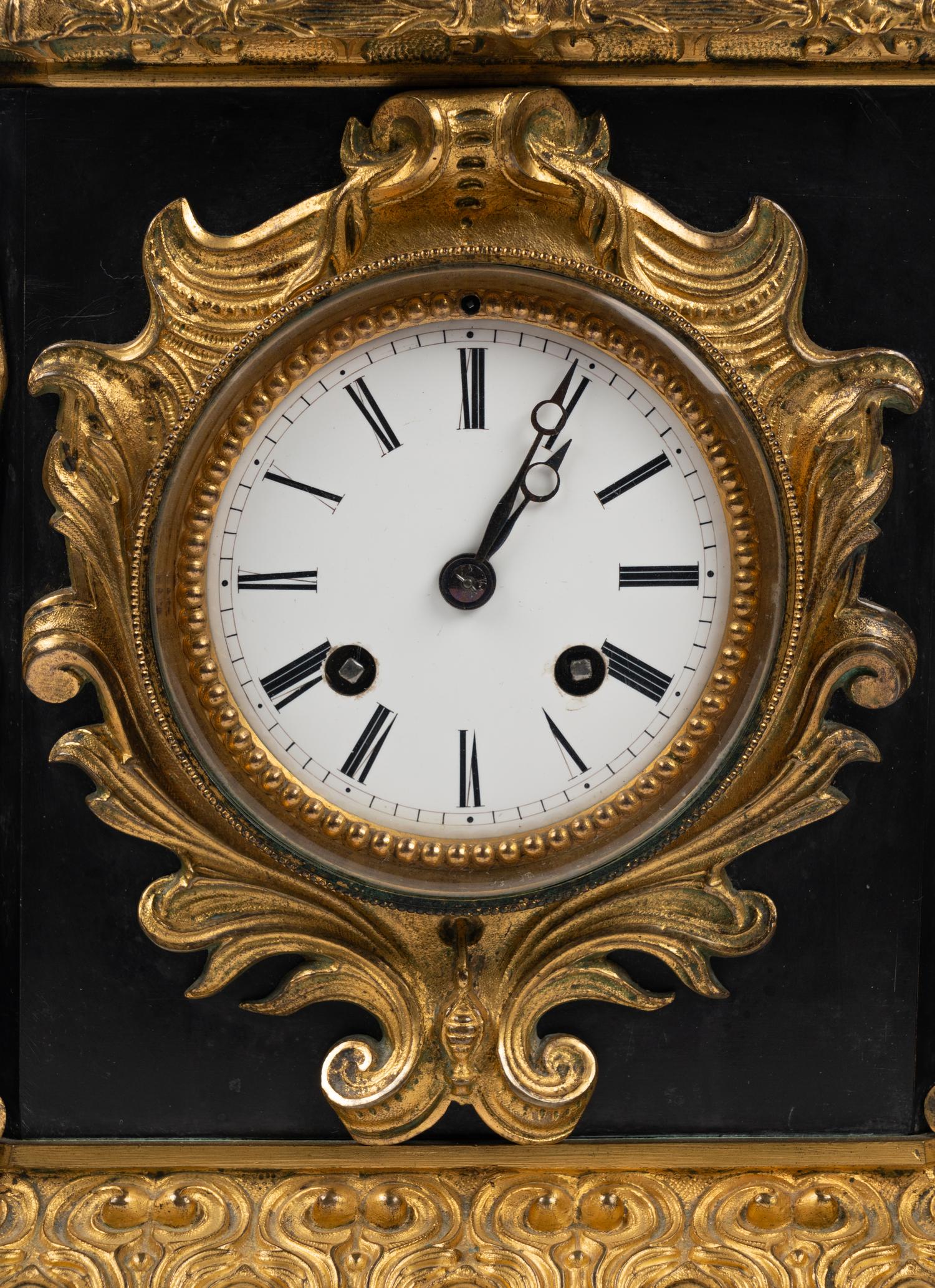 A Napoleon III Gilt Bronze and Slate Clock Garniture