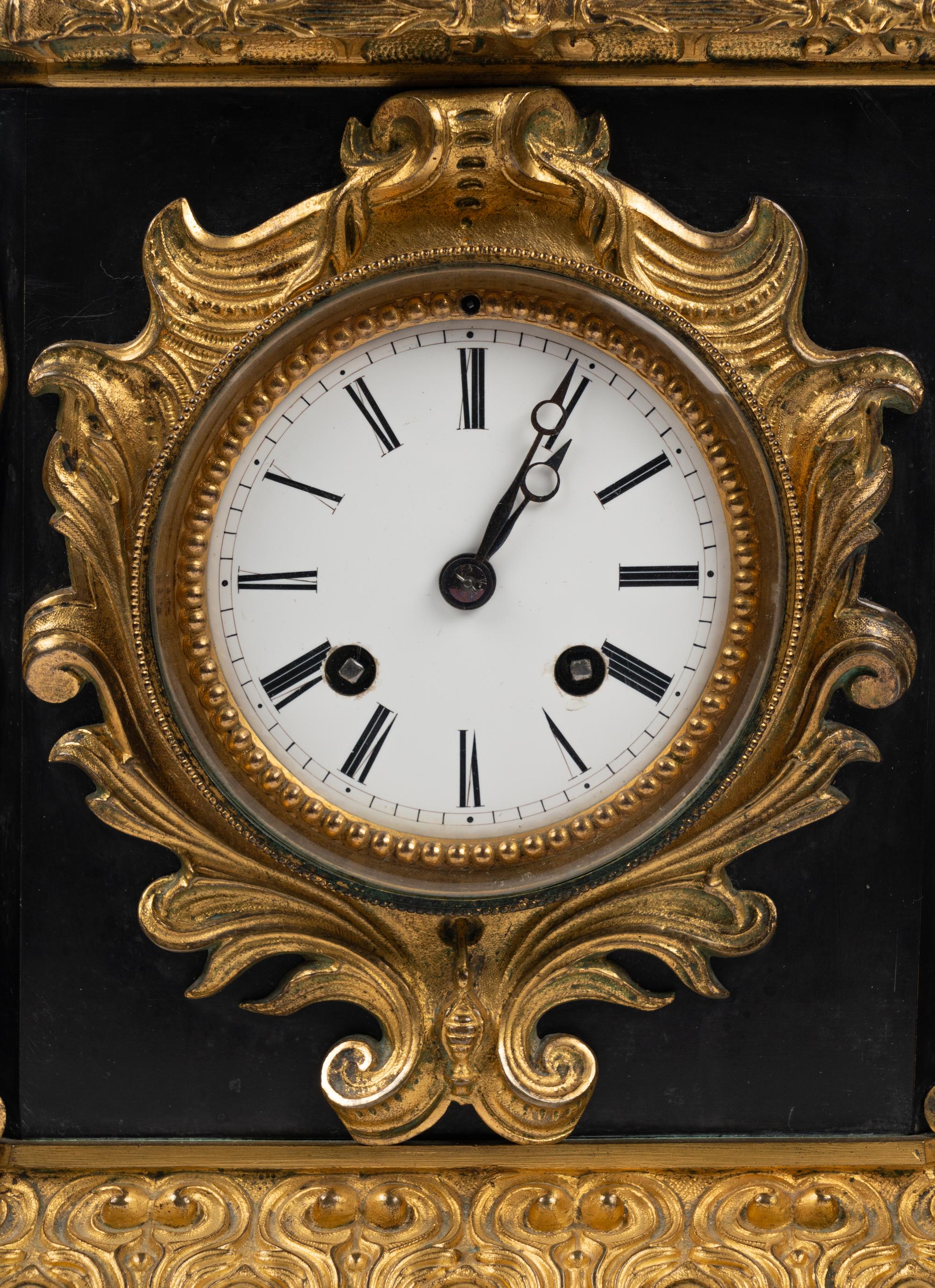 A Napoleon III Gilt Bronze and Slate Clock Garniture