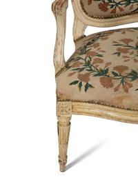 A Pair of Louis XVI Cream Painted Fauteuils