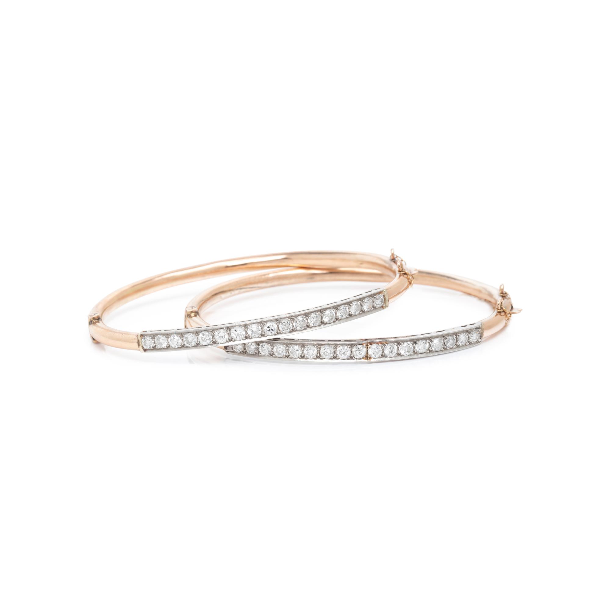 A PAIR OF ROSE GOLD AND DIAMOND BANGLE BRACELETS