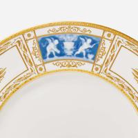 A set of twelve pate-sur-pate gilt and enameled porcelain dinner plates Minton, England, retailed by Tiffany & Co., New York, NY, date marks for 1928-1929