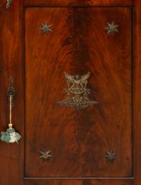An Empire Gilt Bronze Mounted Mahogany Encoignure with a Brèche d'Alep Marble Top