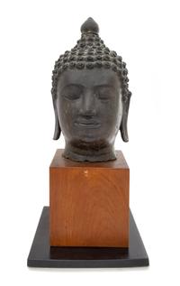A Thai Bronze Buddha Head Height 15 inches. — 18TH CENTURY
