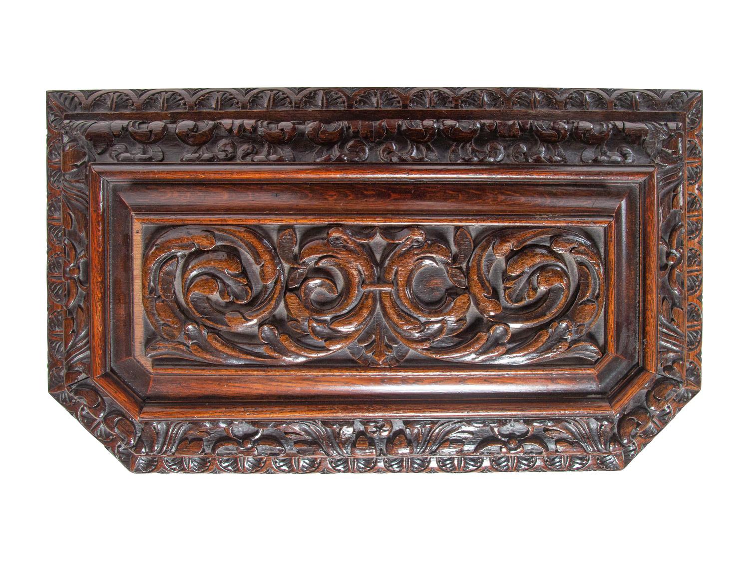 A Renaissance Revival Carved Oak Cellarette