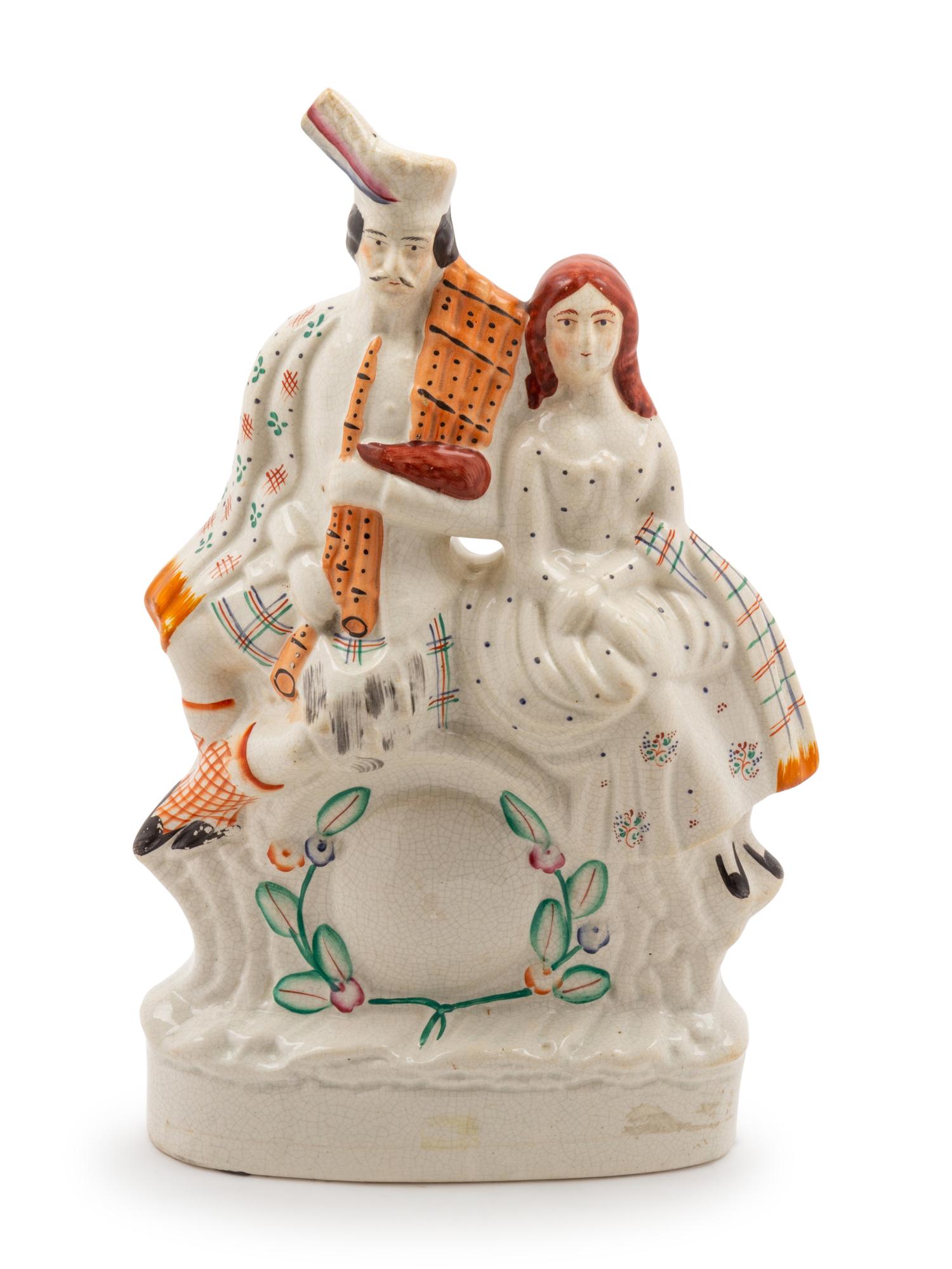 A Staffordshire Figural Group