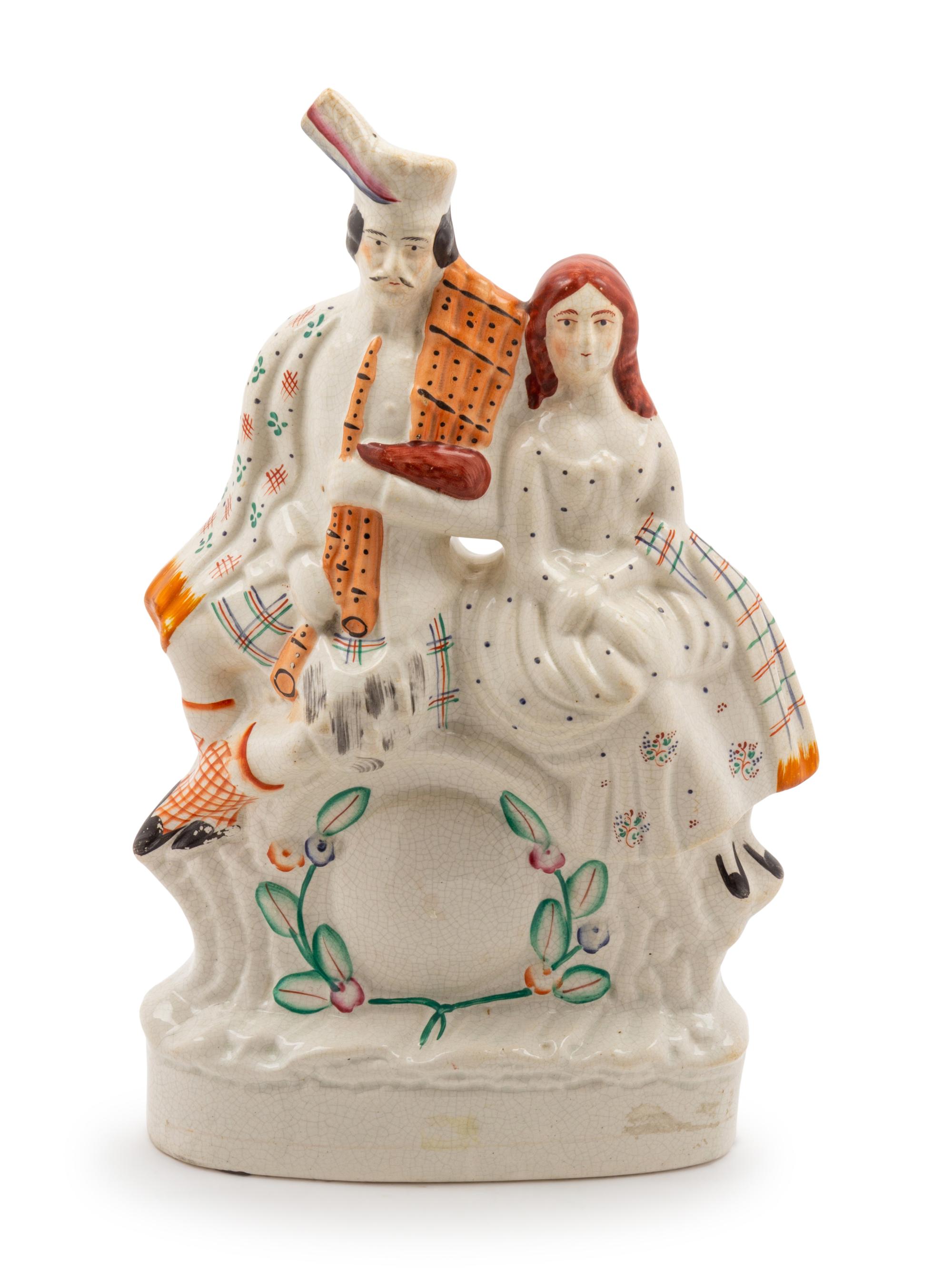 A Staffordshire Figural Group