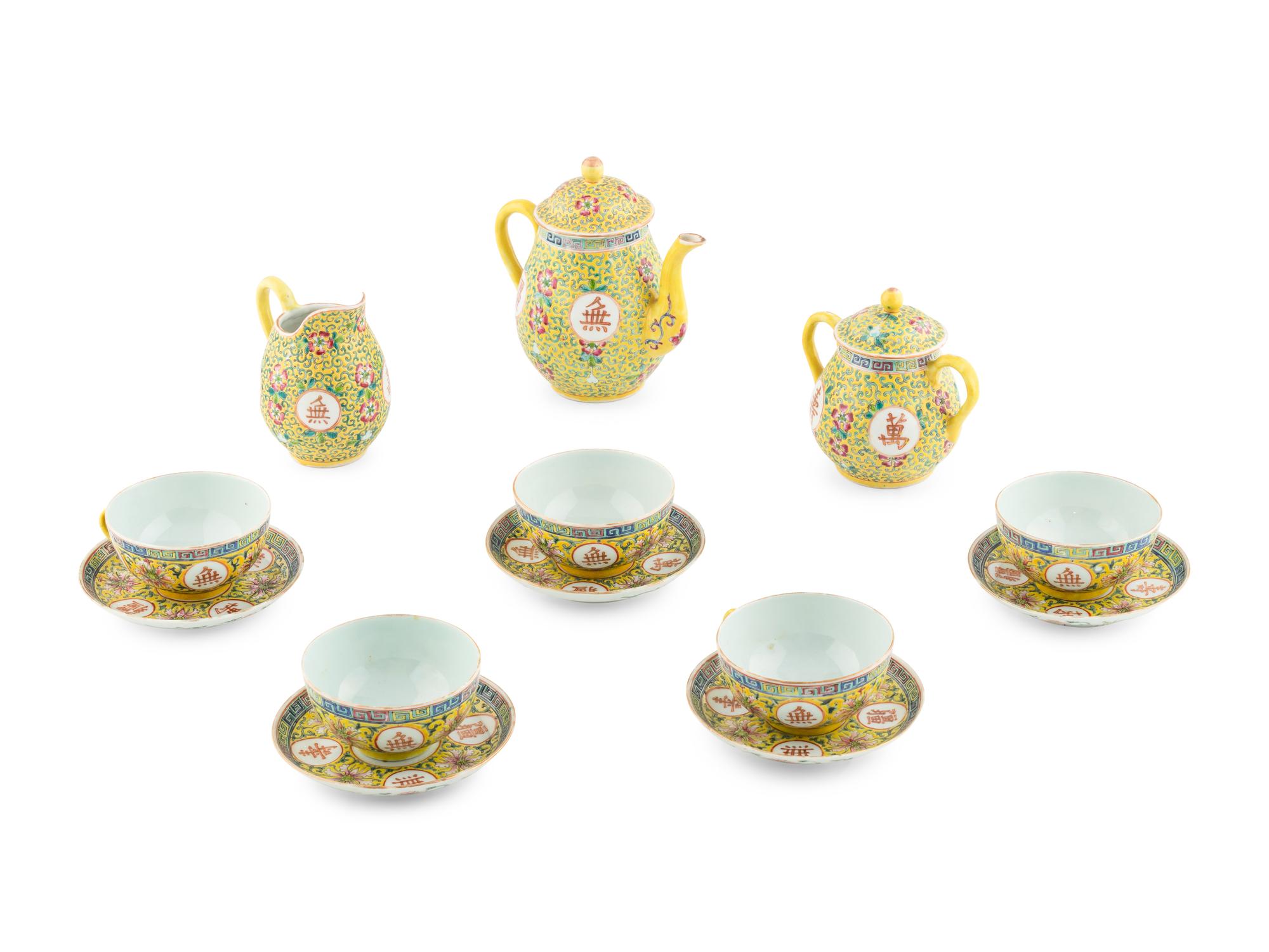 A 13-Piece Chinese Yellow Ground Porcelain Tea Service, Early 20th Century 民國 黃地粉彩‘萬壽無疆’茶具一套