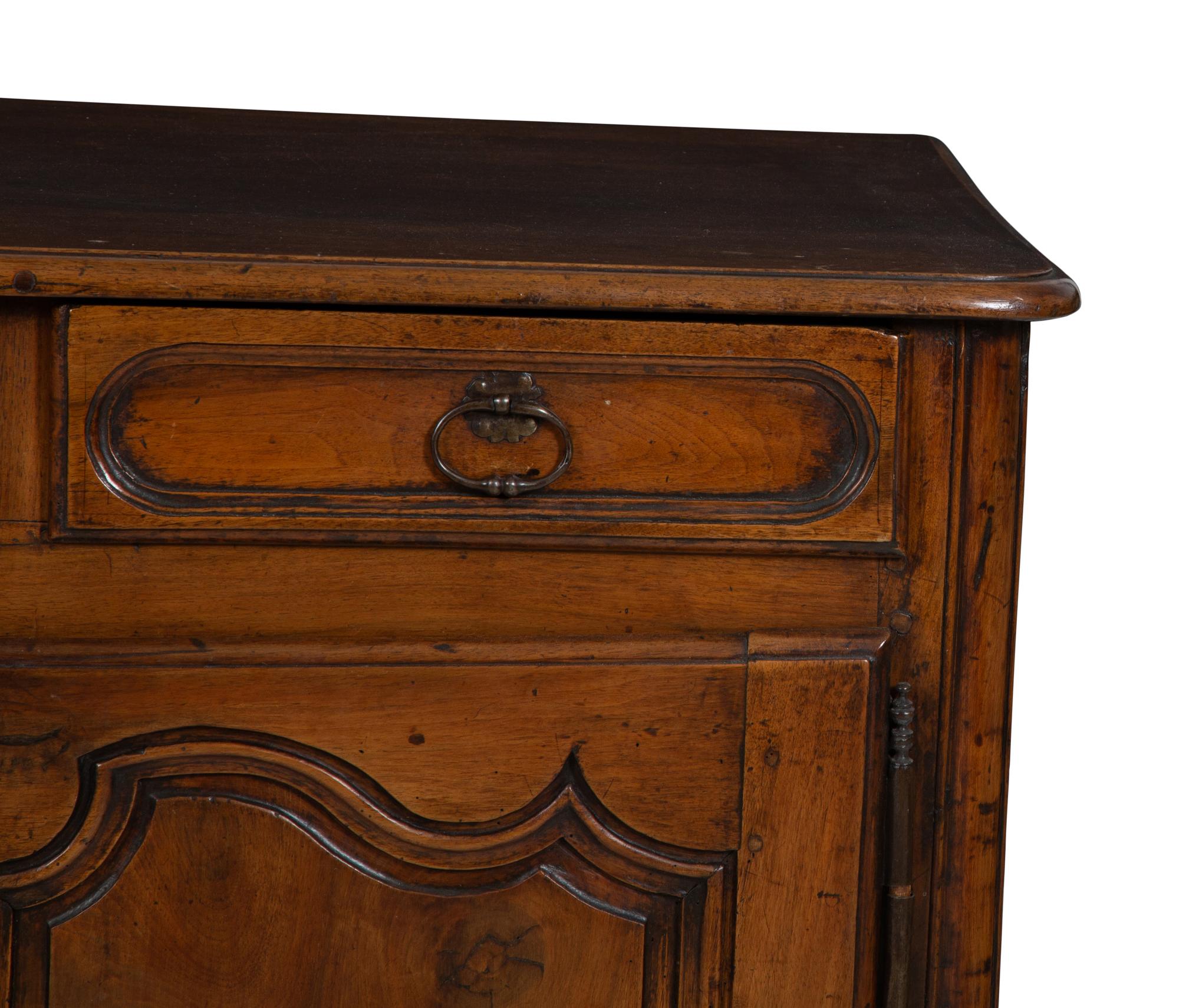A Louis XV Provincial Walnut Serving Cabinet