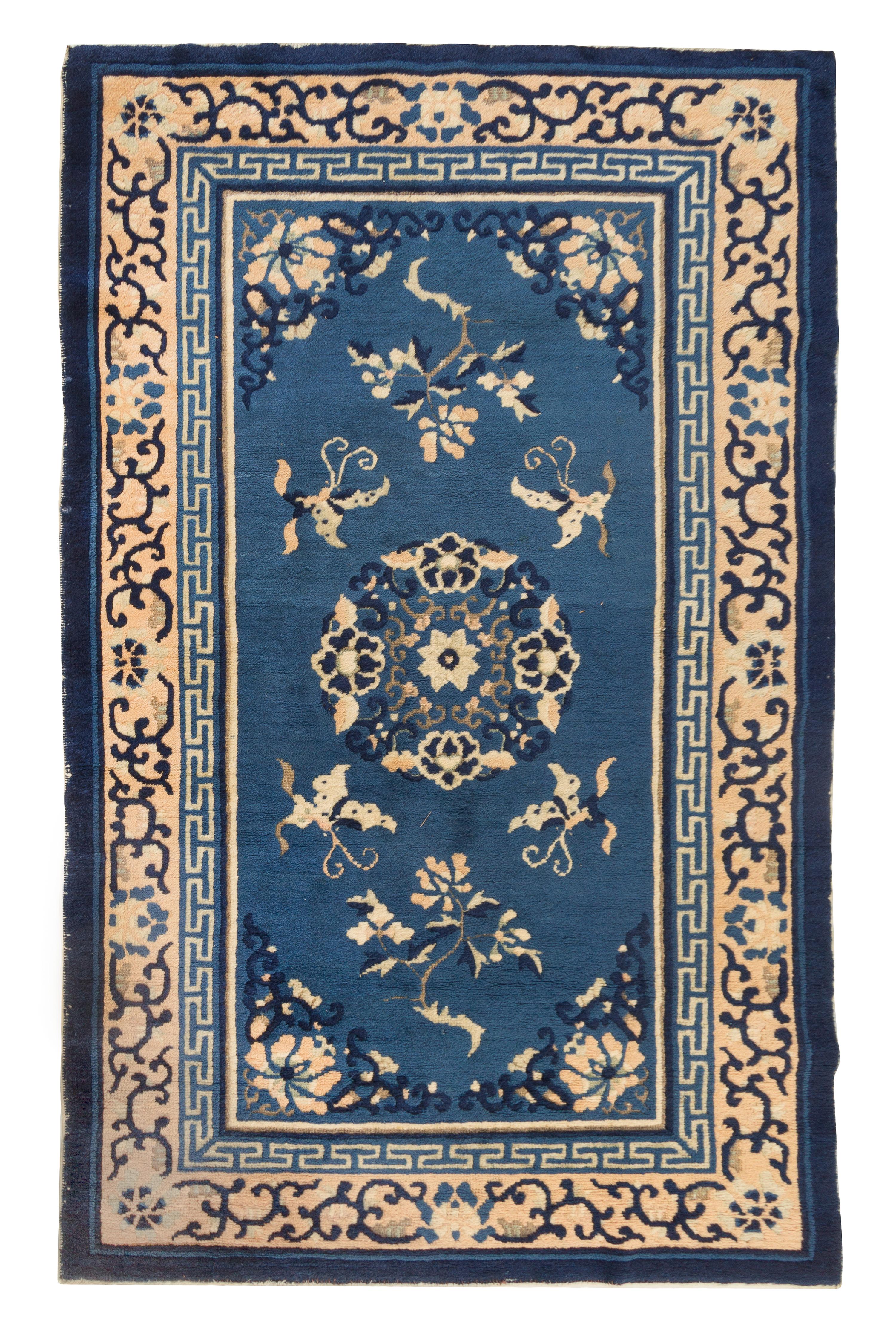 A Chinese Wool Rug Length 2 feet 11 1/2 inches x width 4 feet 9 inches.