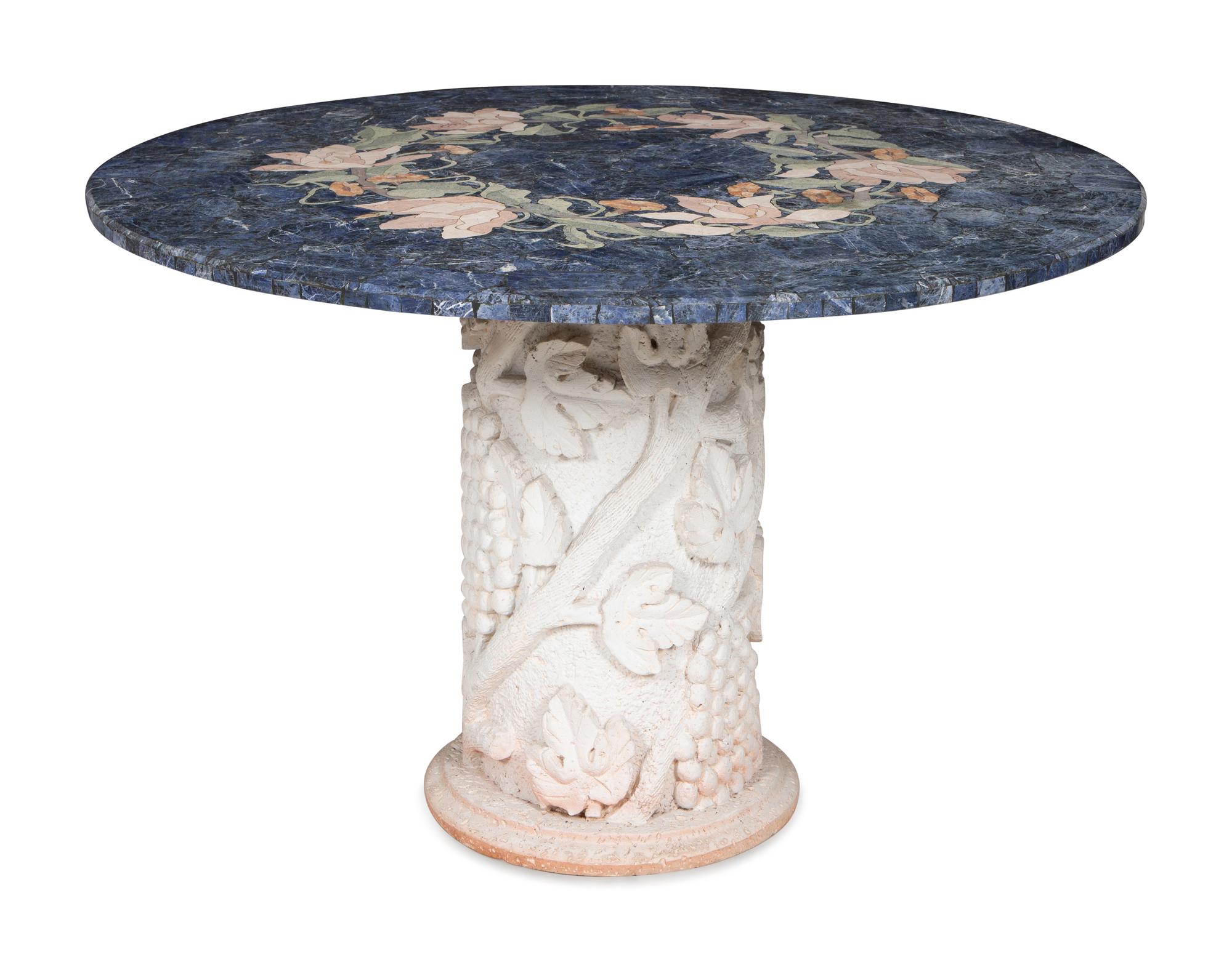 A Cast Stone and Pietra Dura Circular Dining Table
