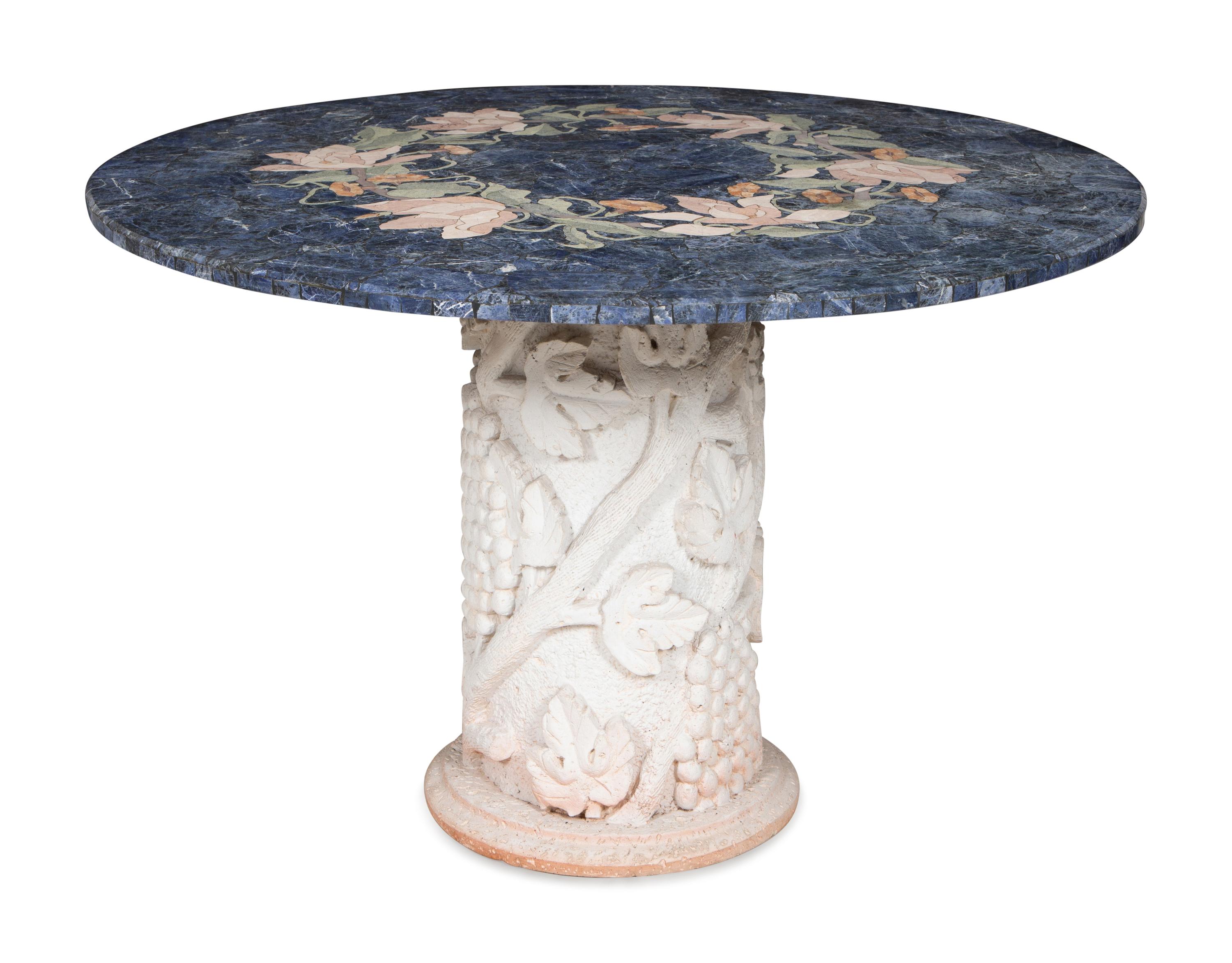 A Cast Stone and Pietra Dura Circular Dining Table