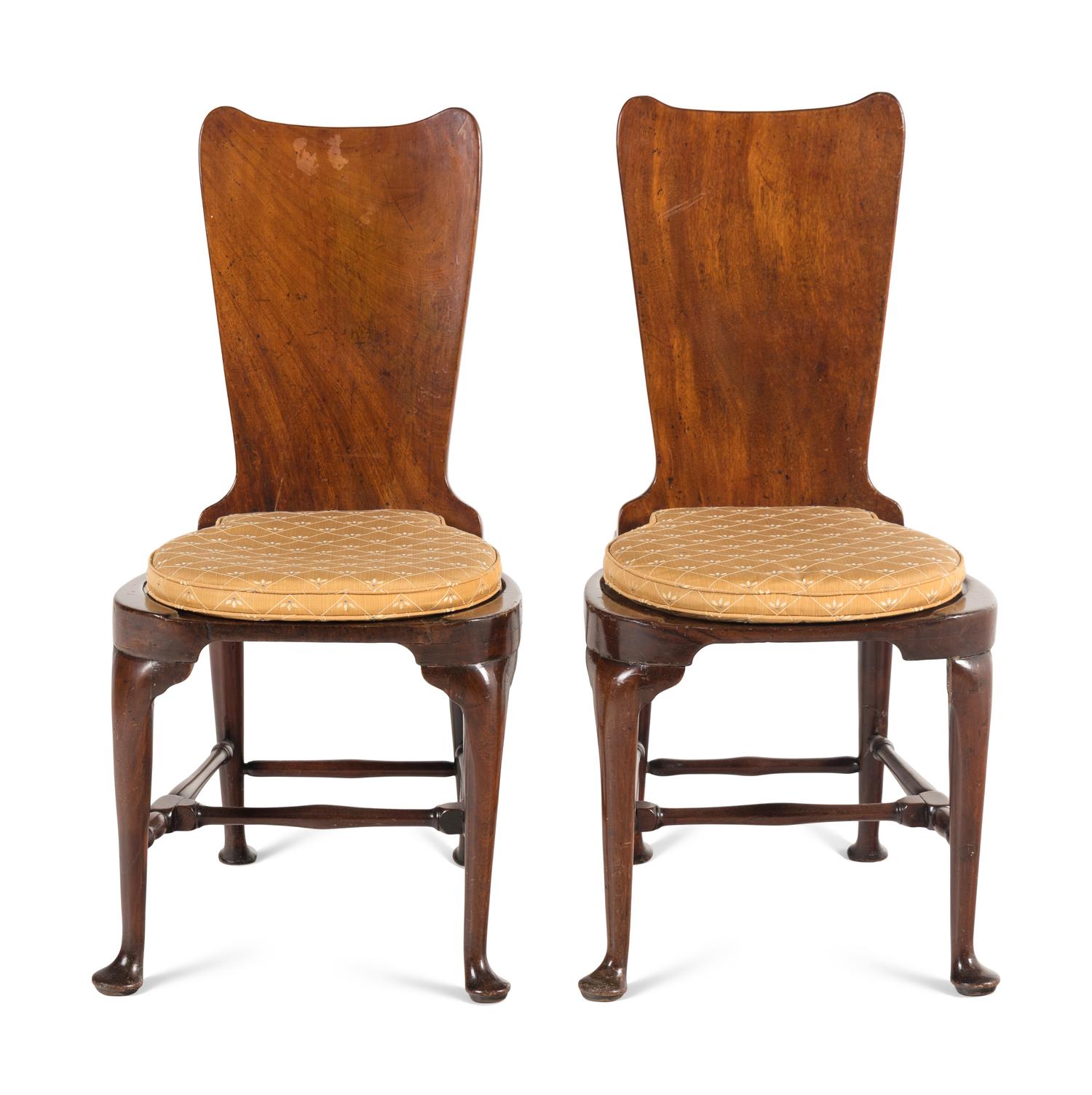 A Pair of George II Mahogany Hall Chairs
