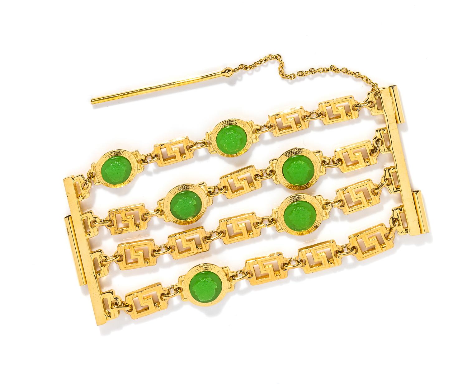 A Gianni Versace Four Strand Greco Link Bracelet, 7.5" x 3.5".