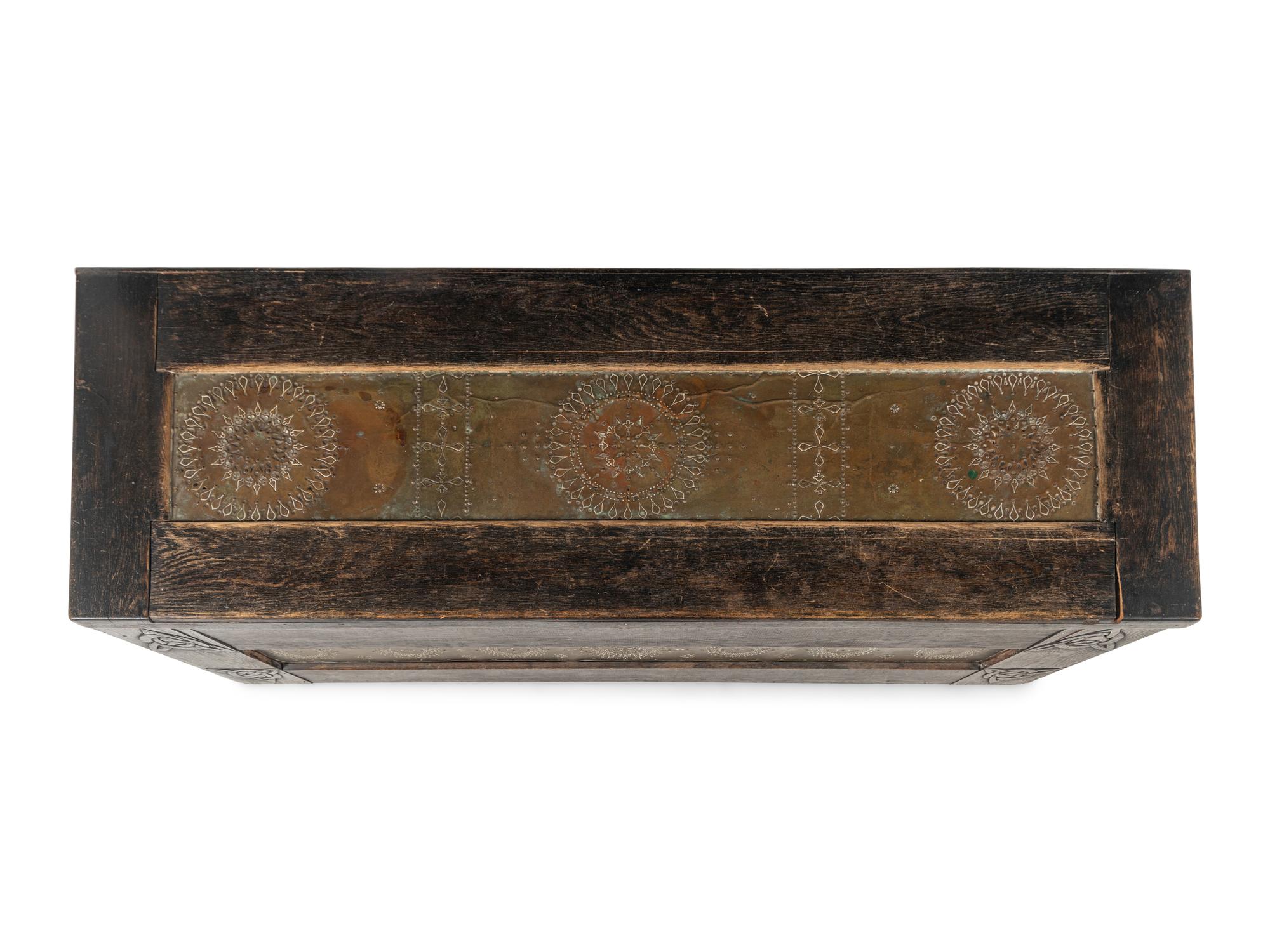 A Repousse Copper-Inset Black Painted Oak Chest circa 1901