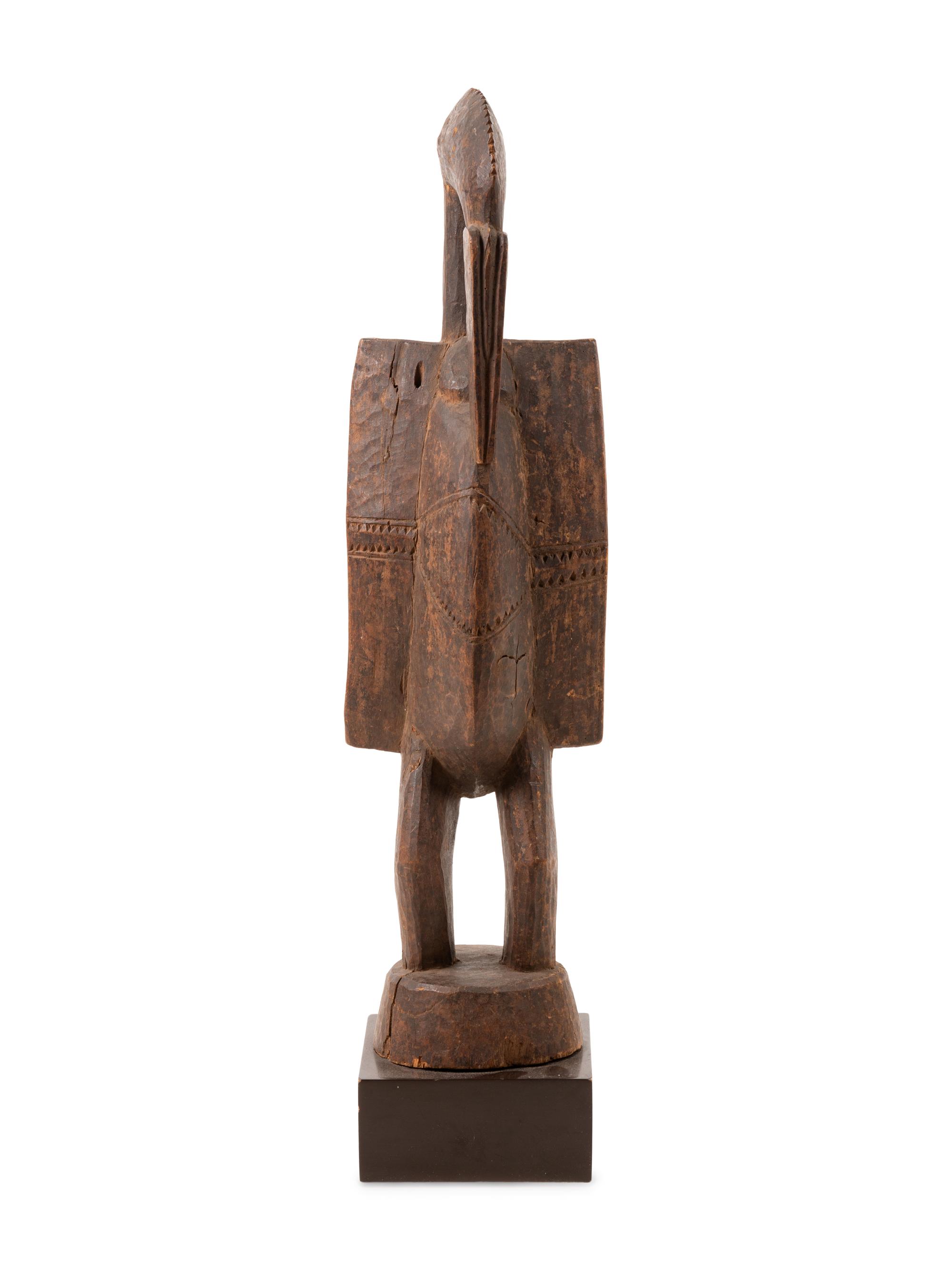 A Senufo Carved Wood Bird Figure