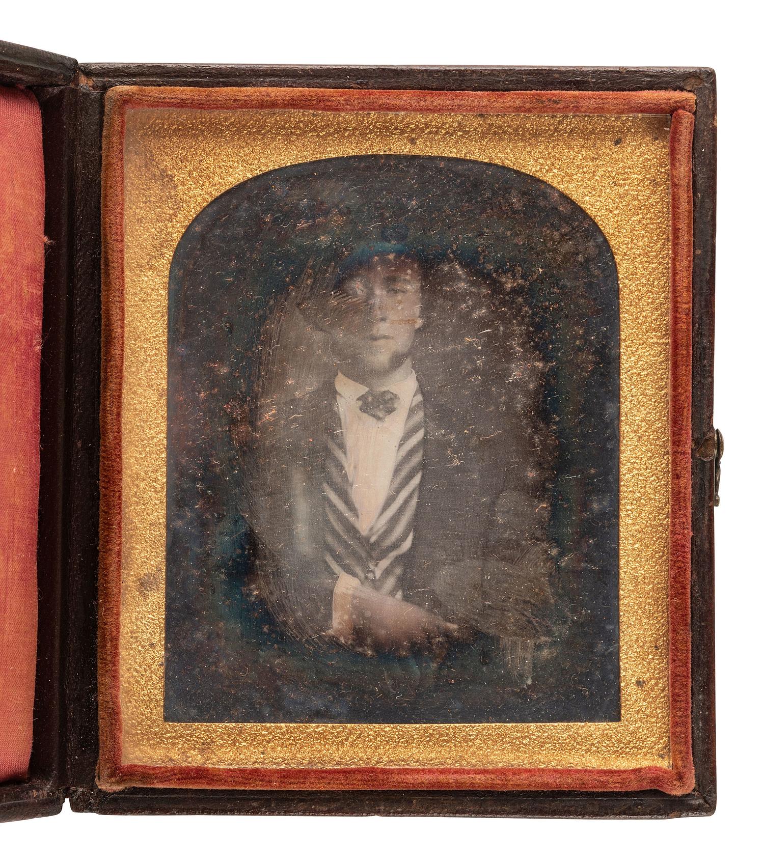[EARLY PHOTOGRAPHY]. 11 assorted daguerreotypes of men.