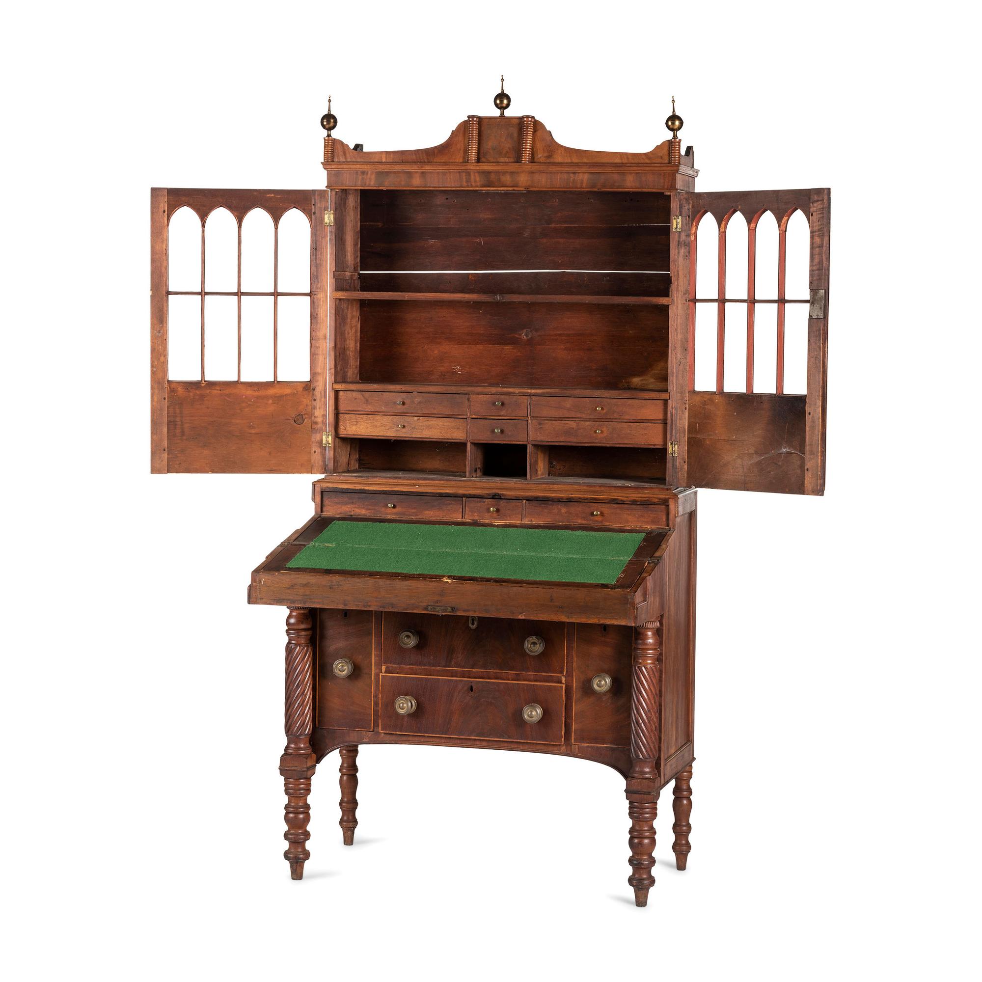 A Classical Figured Maple and Mahogany Desk-and-Bookcase