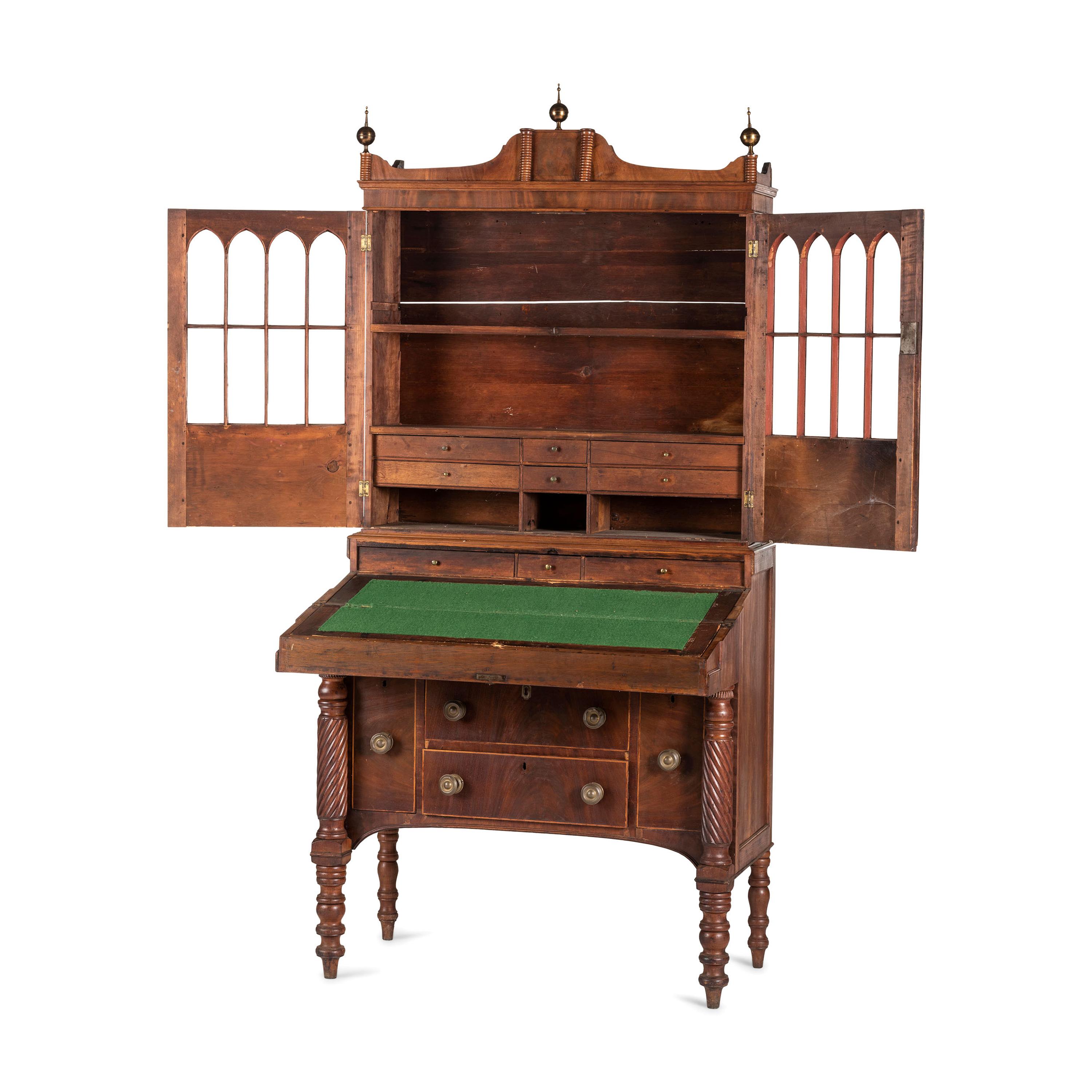 A Classical Figured Maple and Mahogany Desk-and-Bookcase