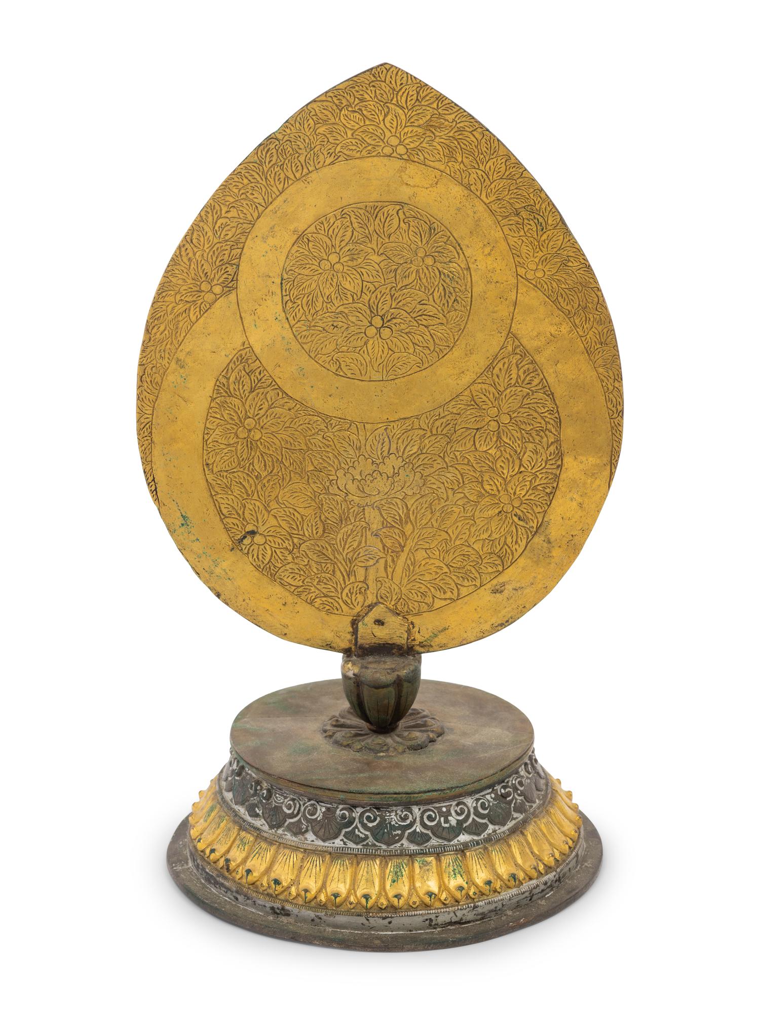 A Tibetan Bronze Figure of Seated Buddha Akshobhya