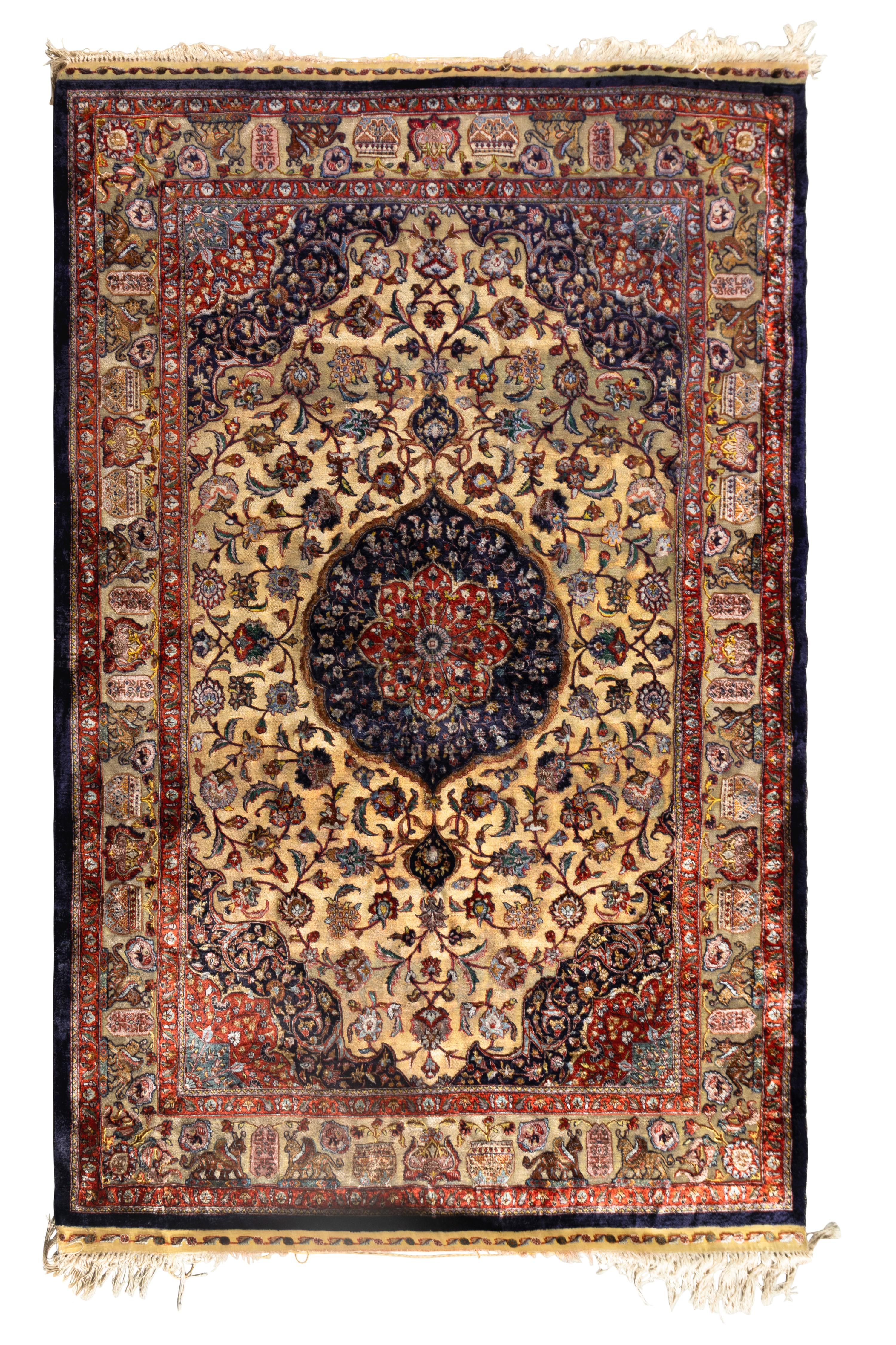A Qom Silk and Metallic Thread Rug