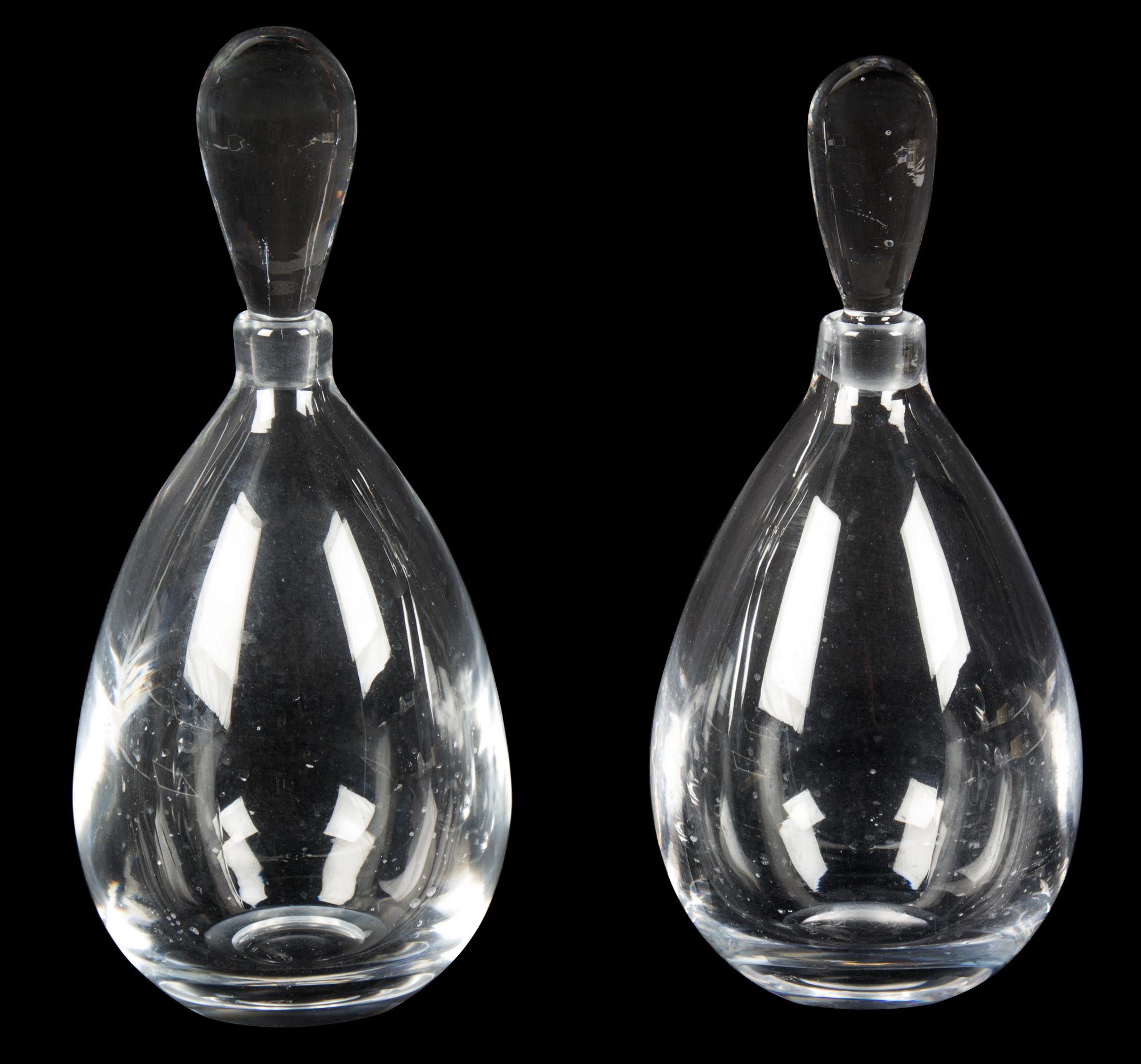 A Pair of Kosta Crystal Teardrop-Form Decanters Height 8 1/4 inches. — 20TH CENTURY