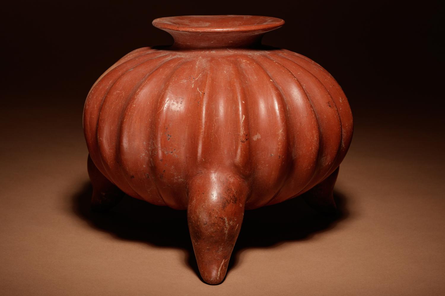 A Colima Terracotta Gadrooned Tripod Vessel