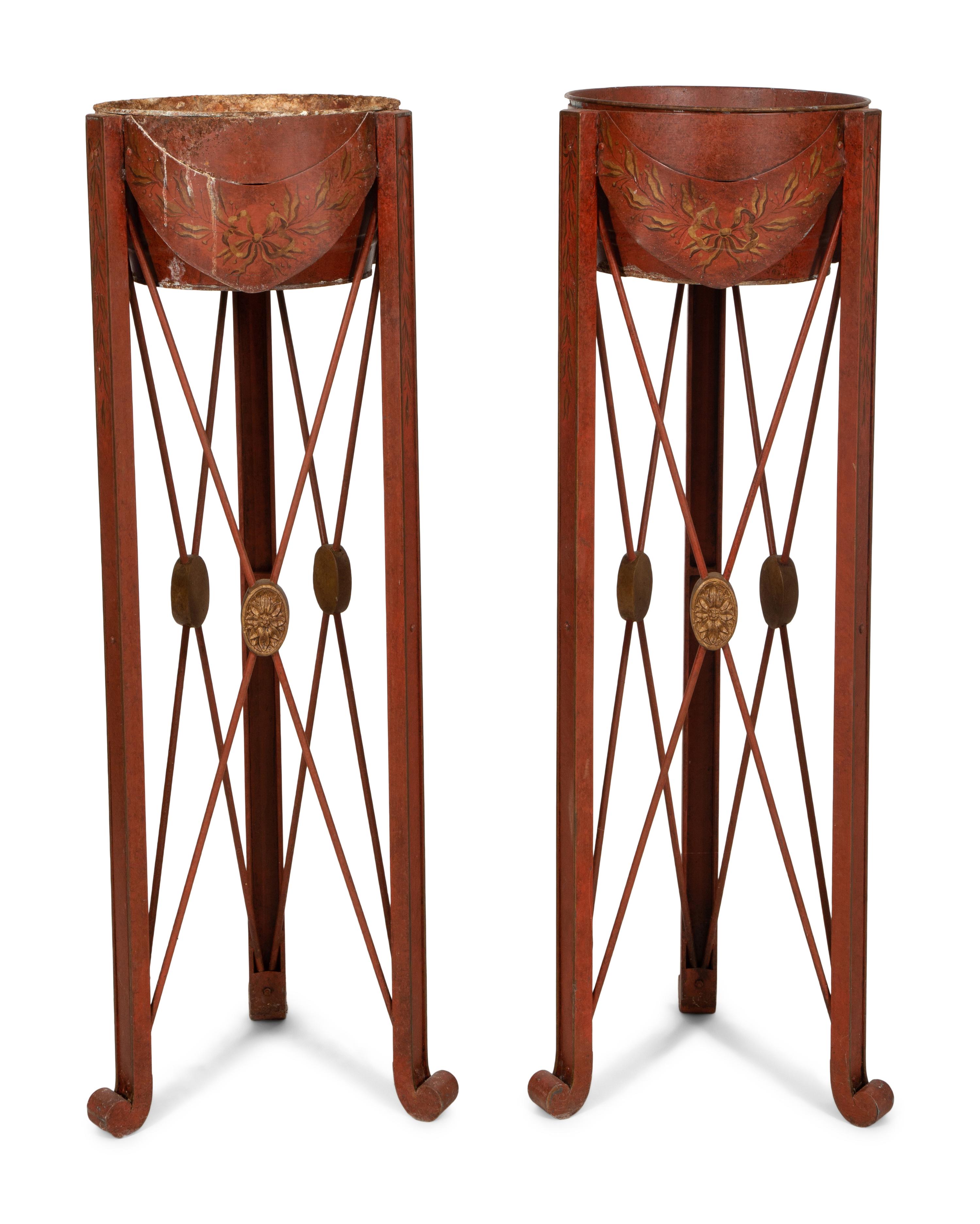 A Pair of Red and Gold Tole Peinte Jardiniere Stands