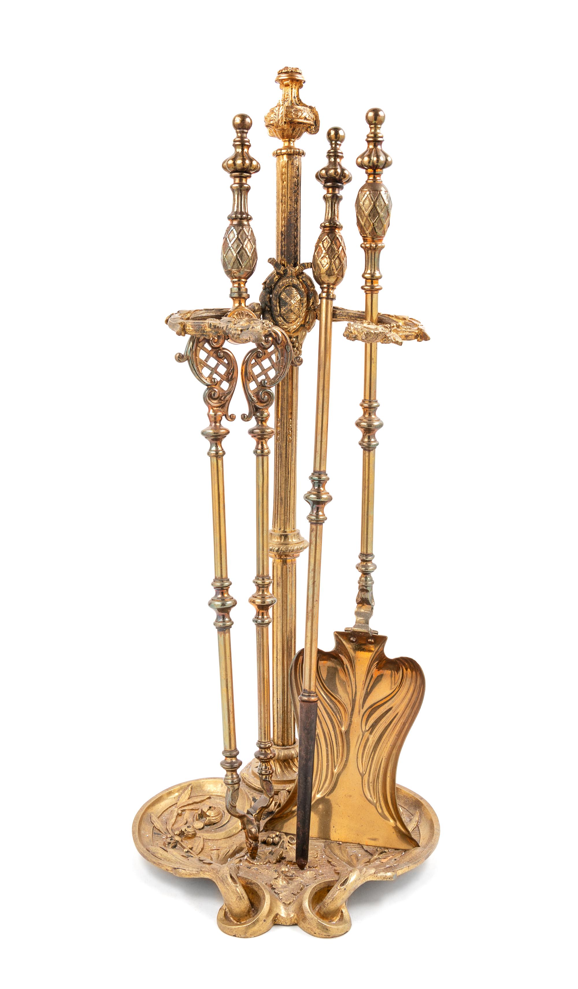 A Set of French Gilt Bronze Fireplace Tools