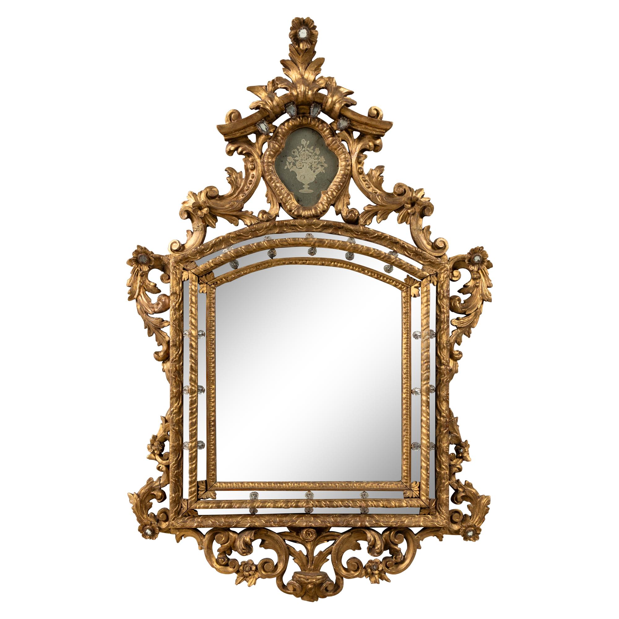 A Venetian Giltwood and Etched Glass Mirror