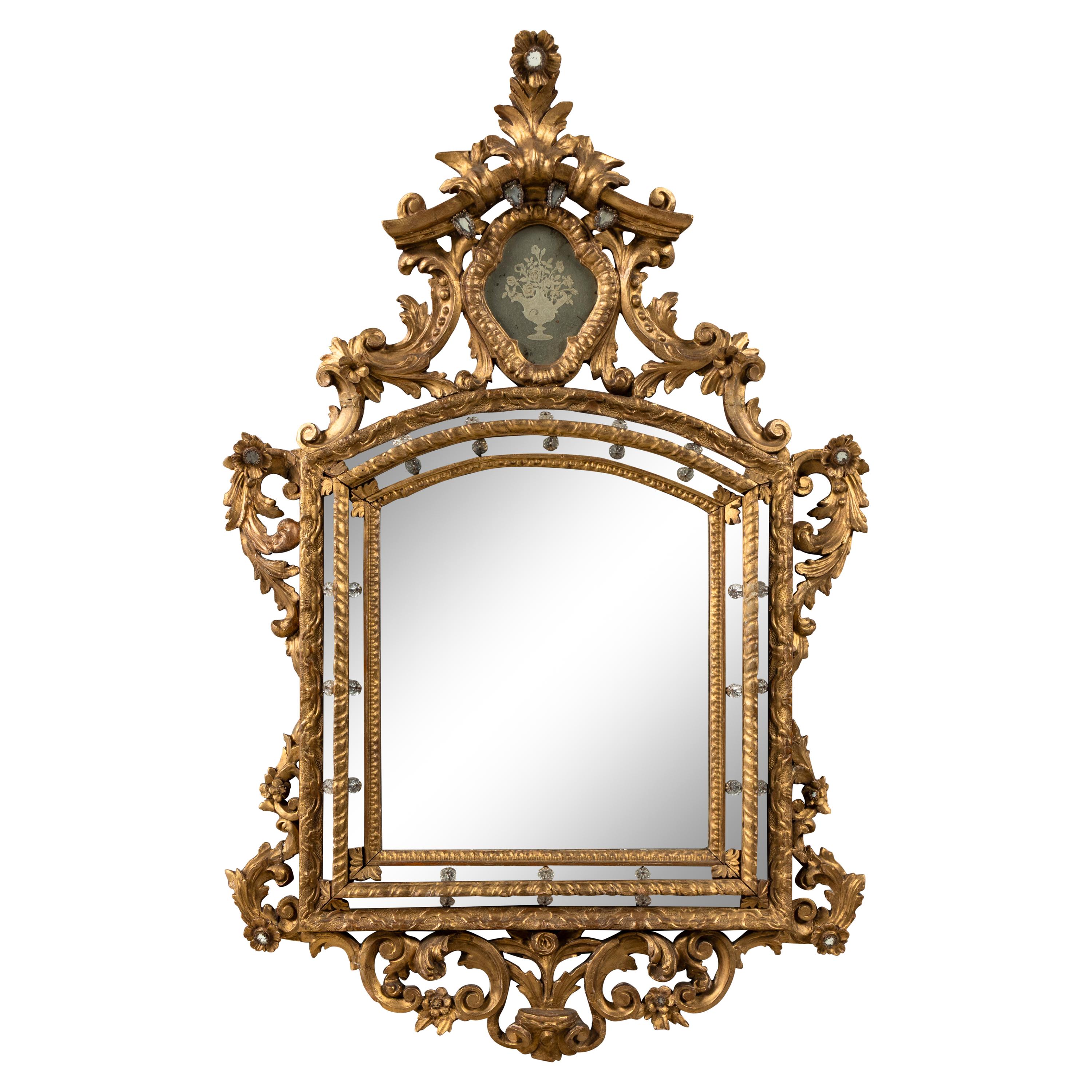 A Venetian Giltwood and Etched Glass Mirror
