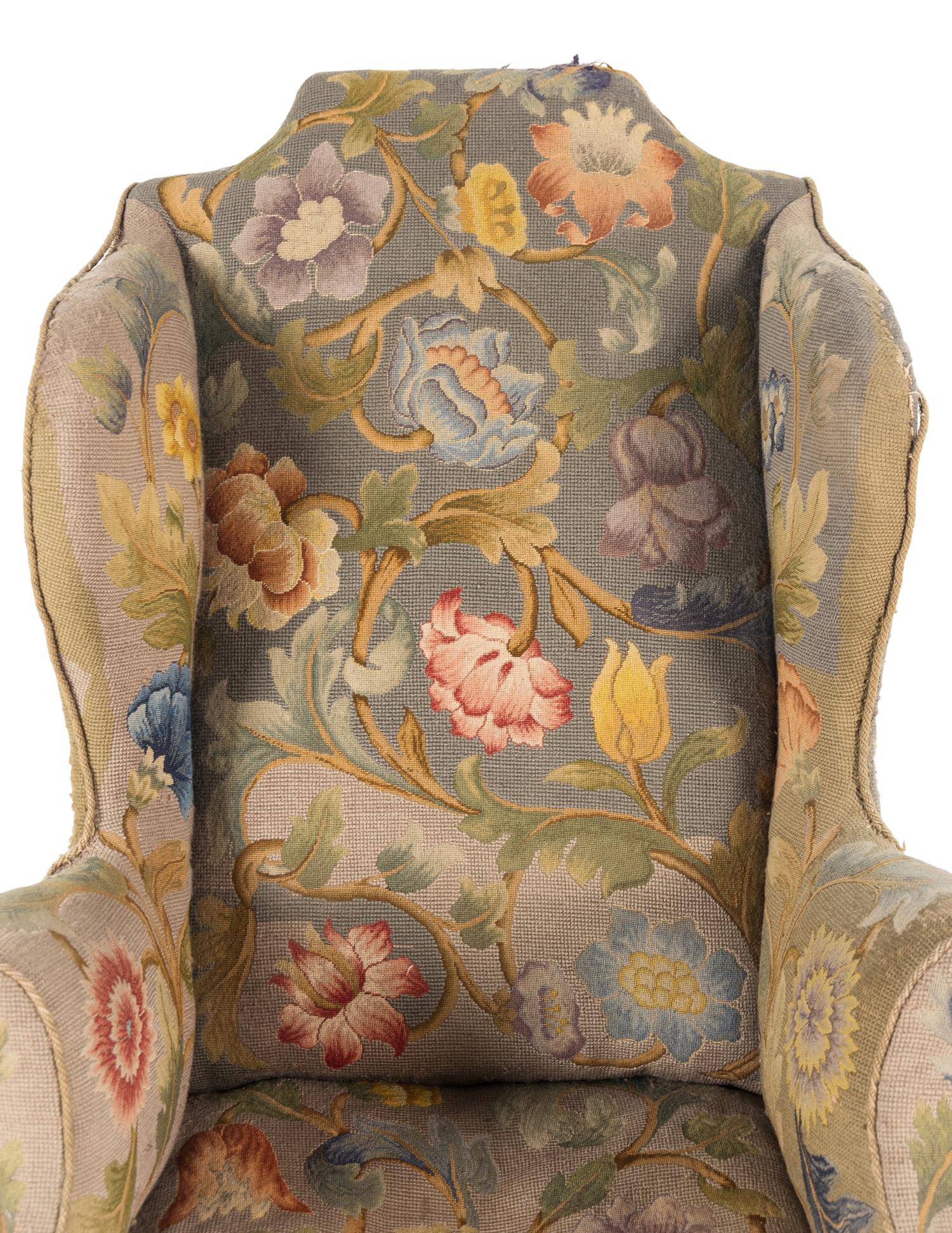 A Queen Anne Beechwood and Pine Wingback Armchair