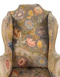 A Queen Anne Beechwood and Pine Wingback Armchair