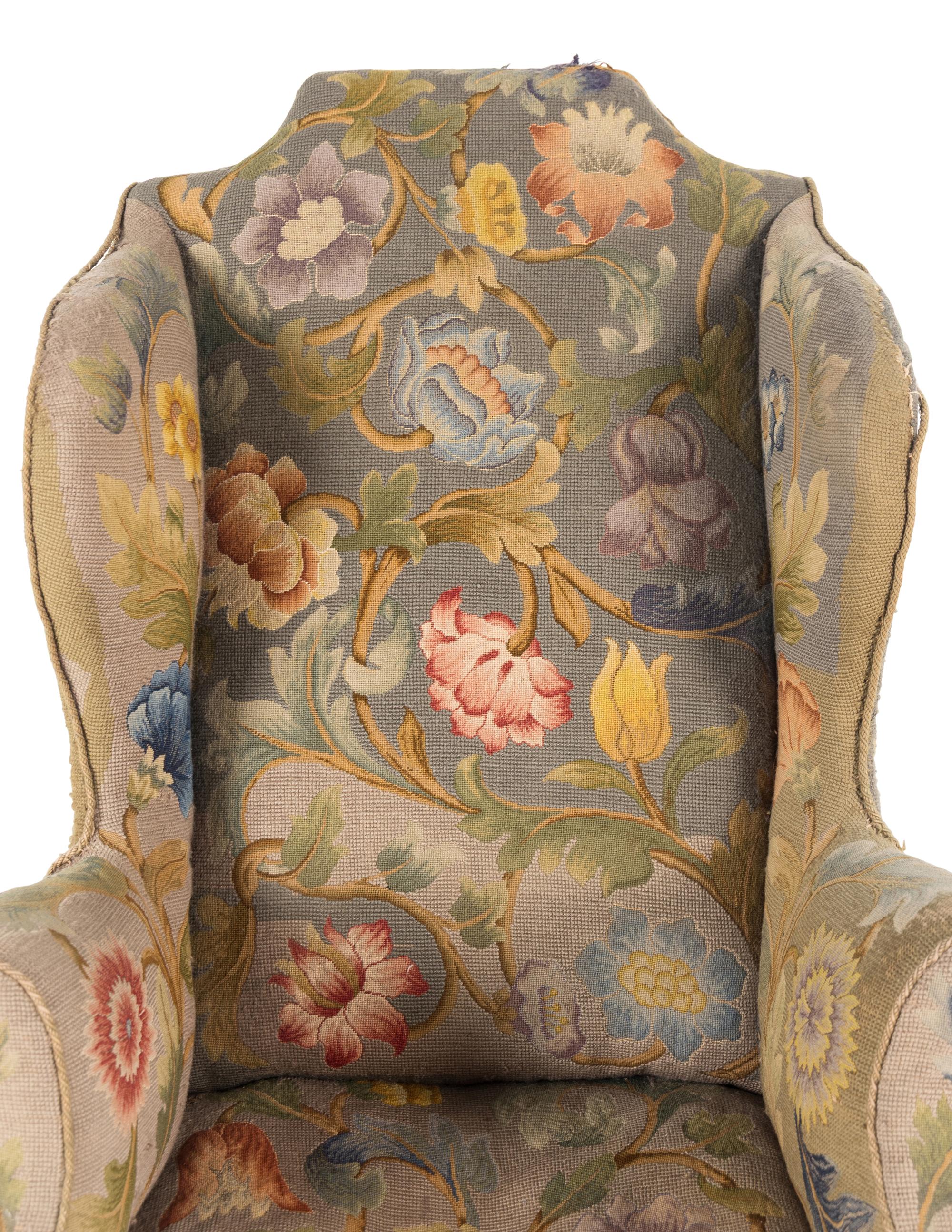 A Queen Anne Beechwood and Pine Wingback Armchair