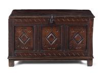A Charles II Carved Oak Blanket Chest