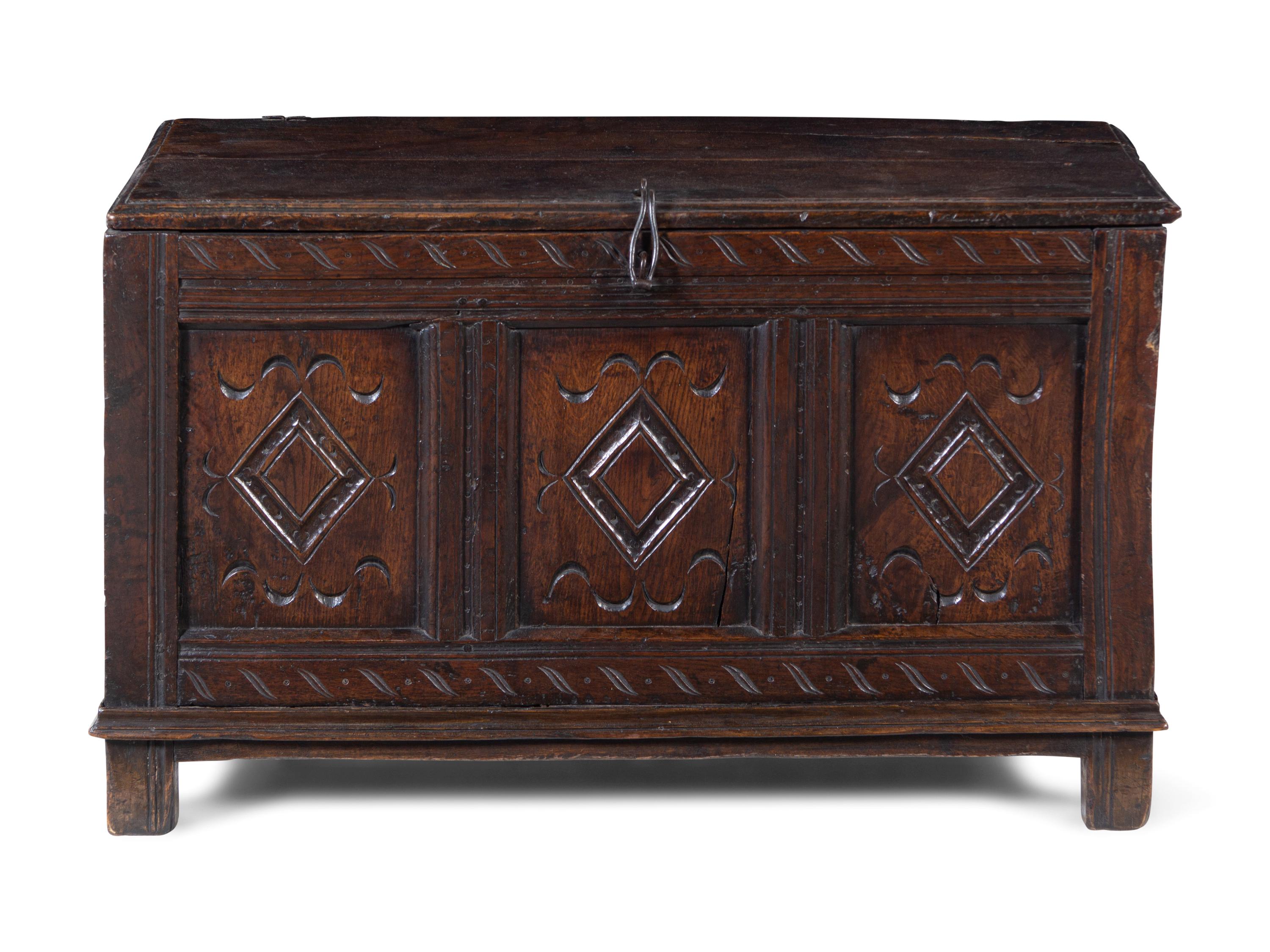 A Charles II Carved Oak Blanket Chest